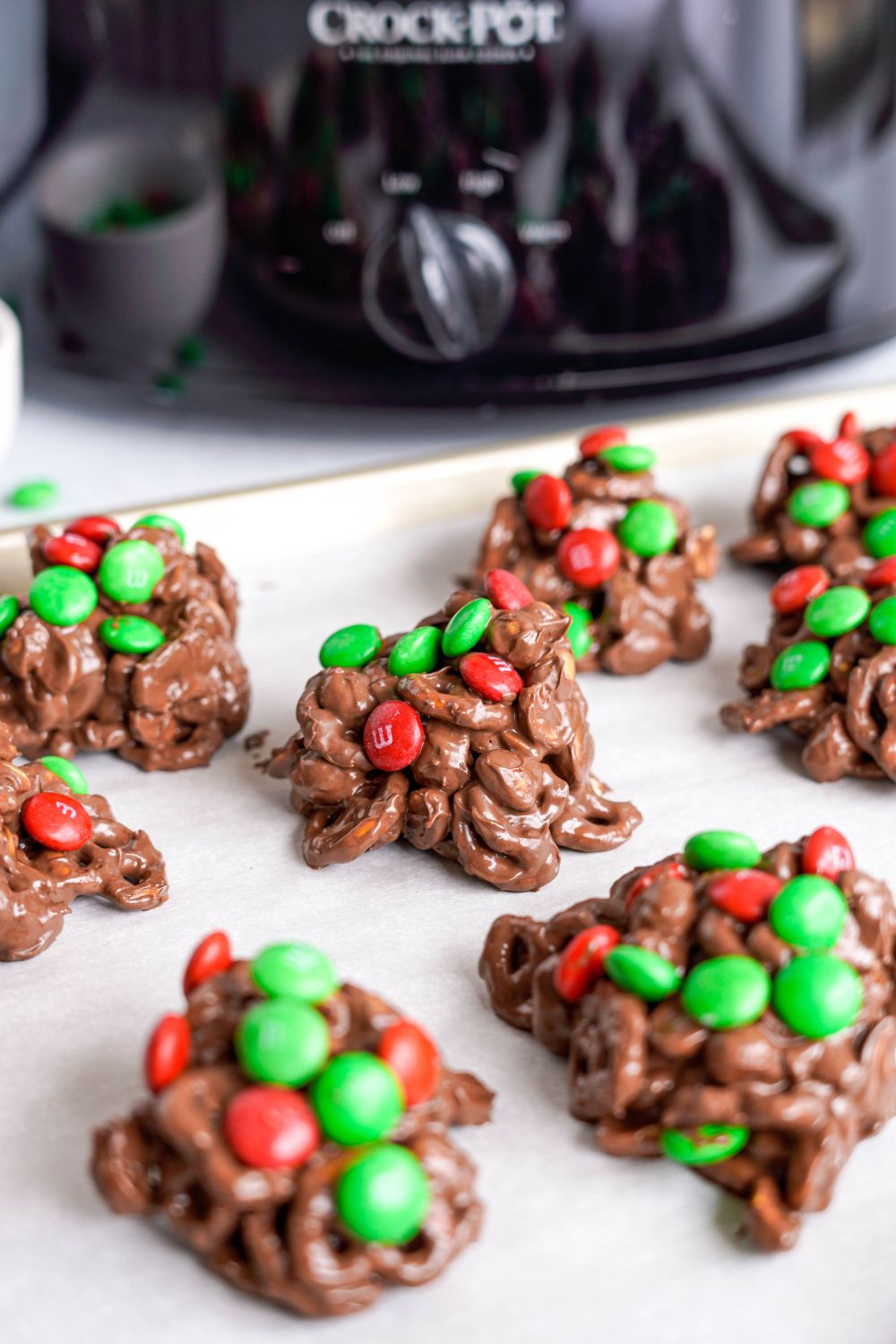 crockpot with scoops of candy in front