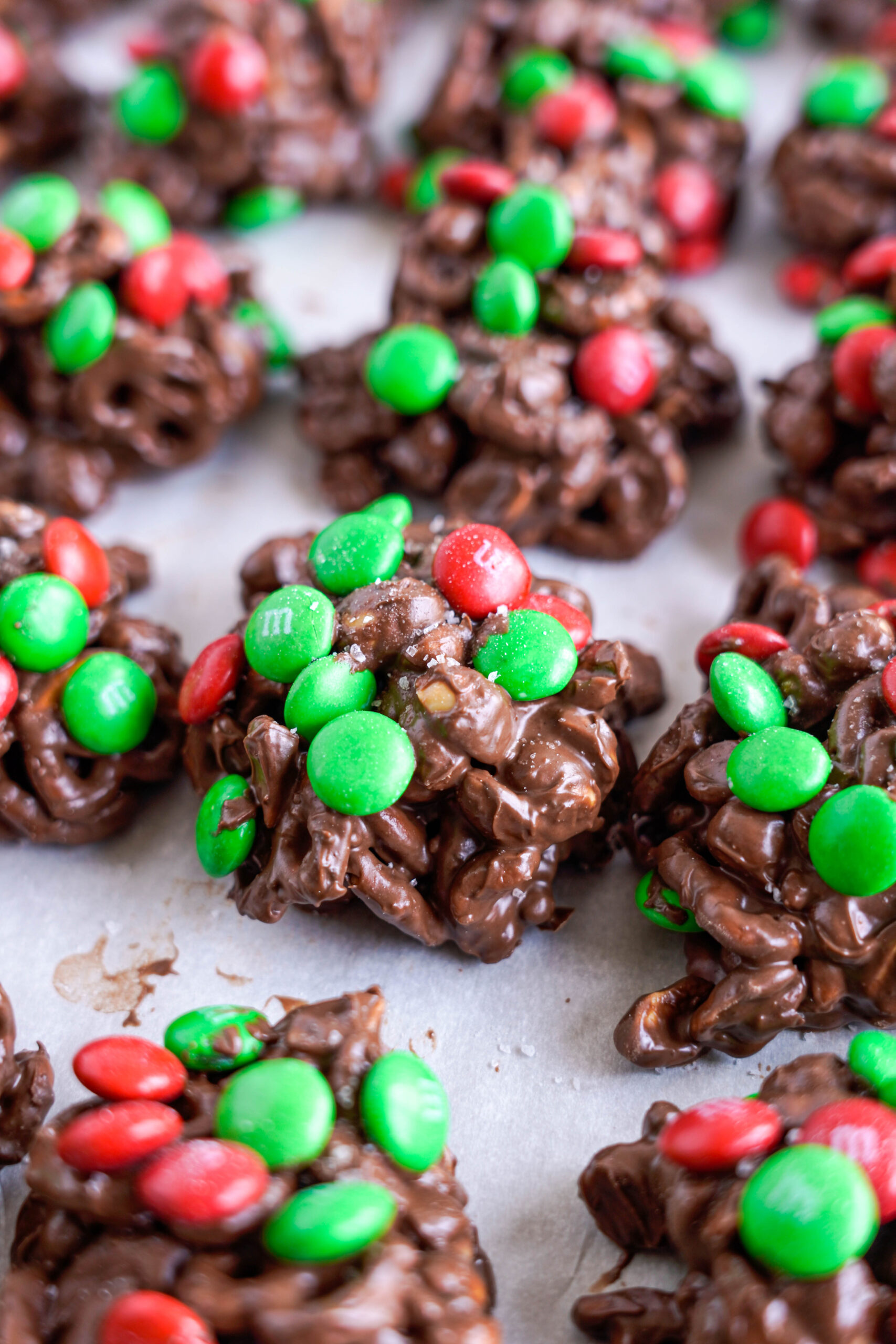 Crockpot Chocolate Pretzel Christmas Candy in a row on a baking sheet