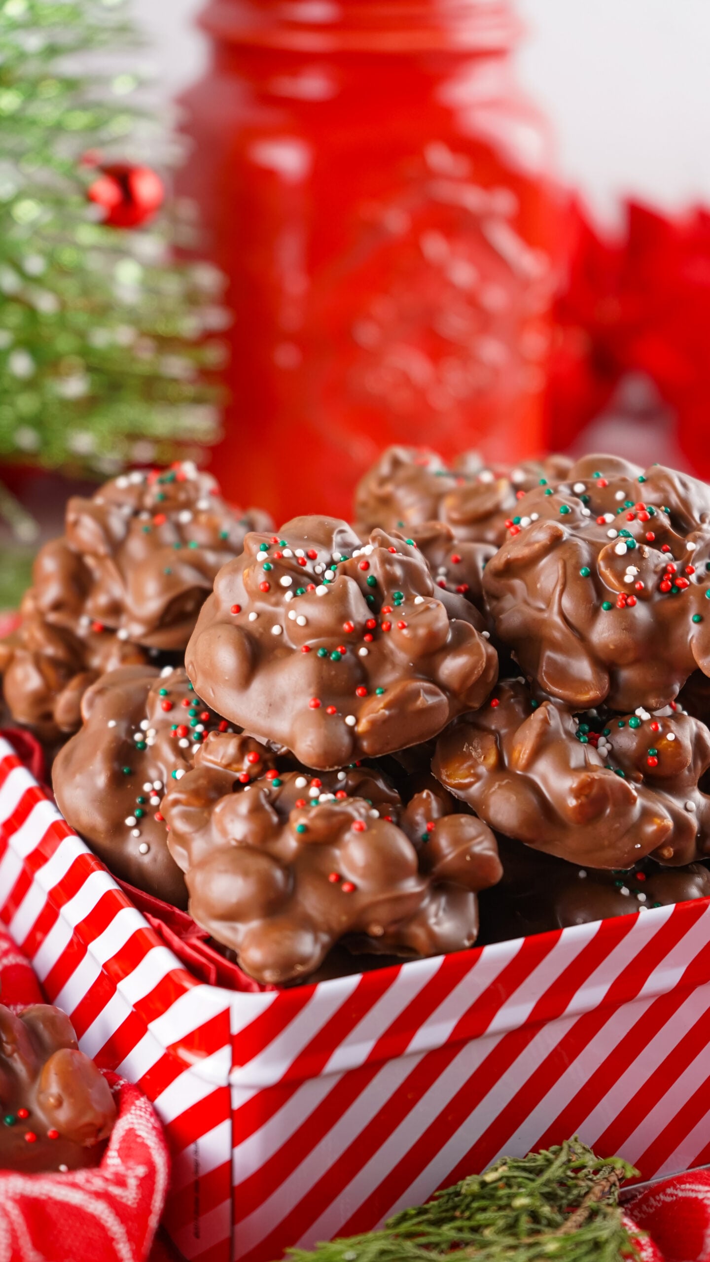 Crockpot Christmas Candy in a christmas cookie tin