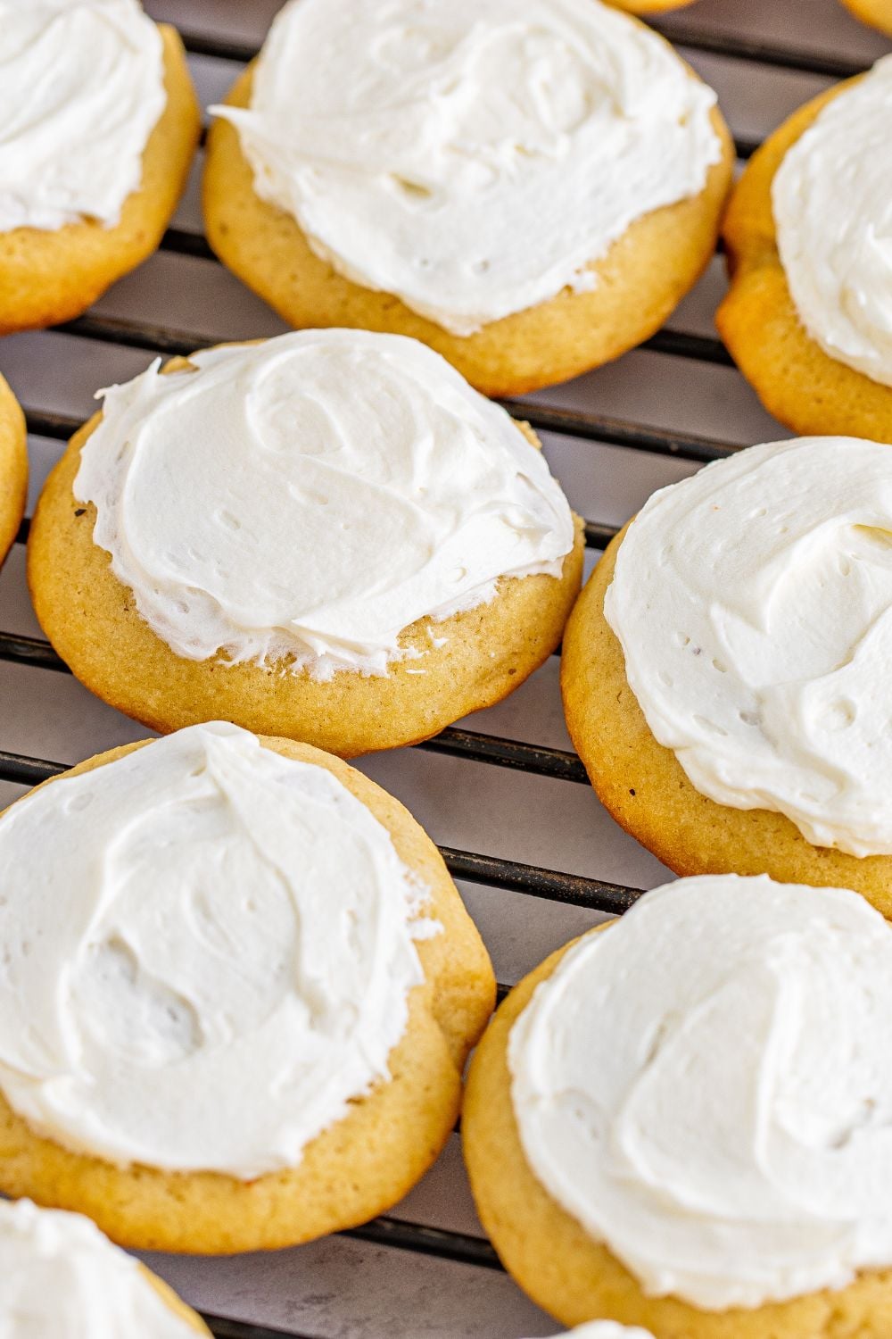 Soft Frosted Eggnog Cookies on a cooling rack