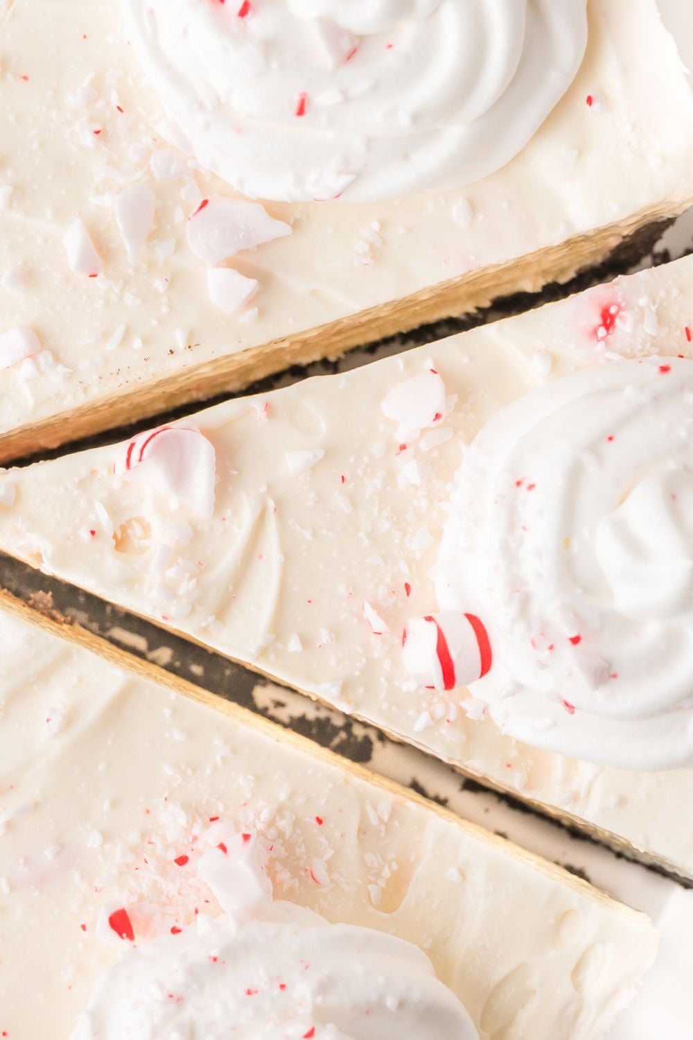 slice cut out of peppermint cheesecake 