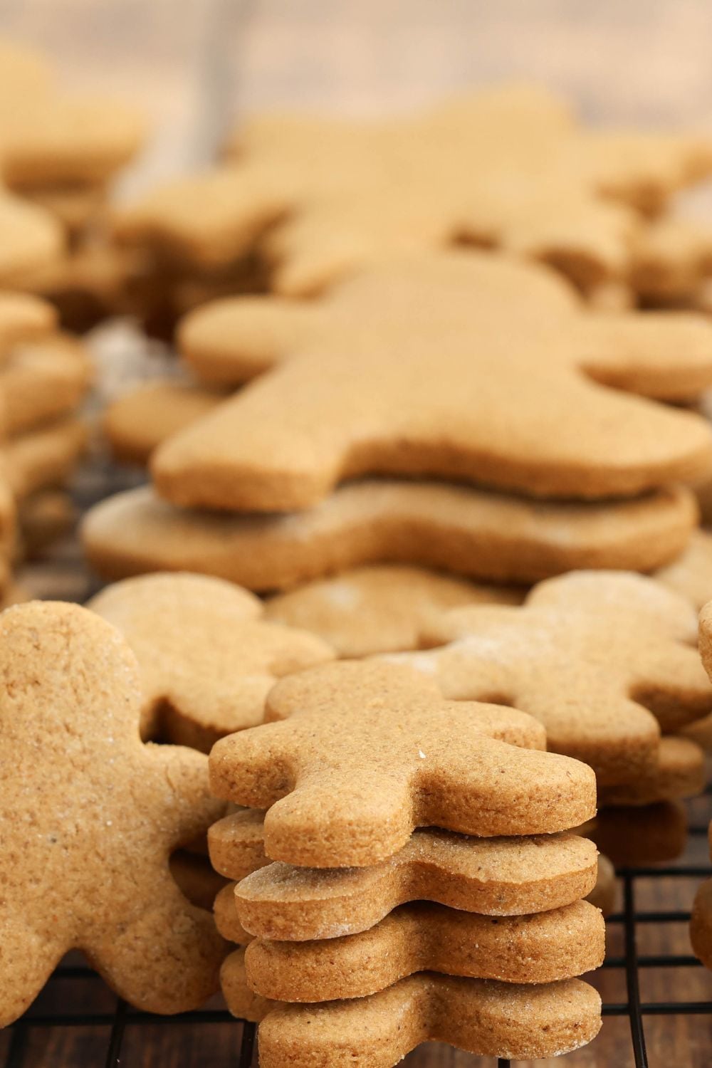 stack of unfrosted gingerbread cookies on the table 