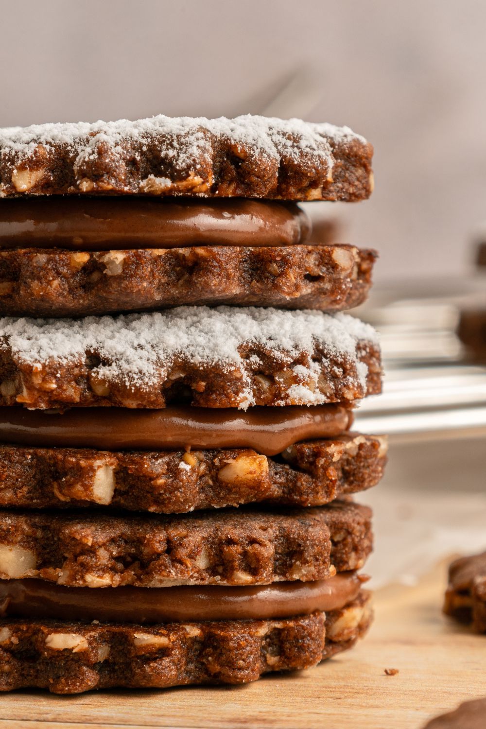 stalk of Chocolate Linzer Cookies on the table 