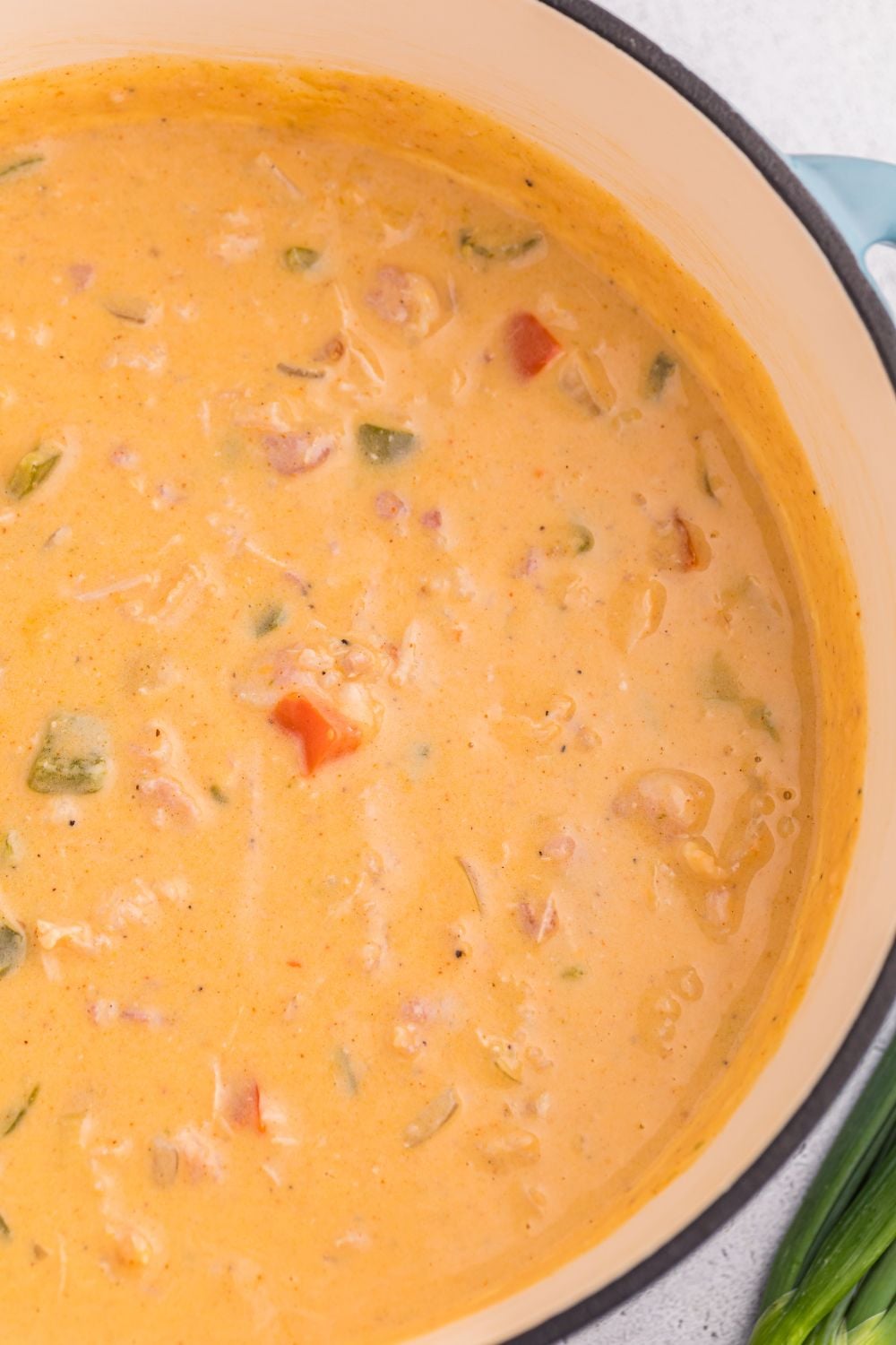 stock pot full of cheesy jalapeño popper crack chicken soup on the table