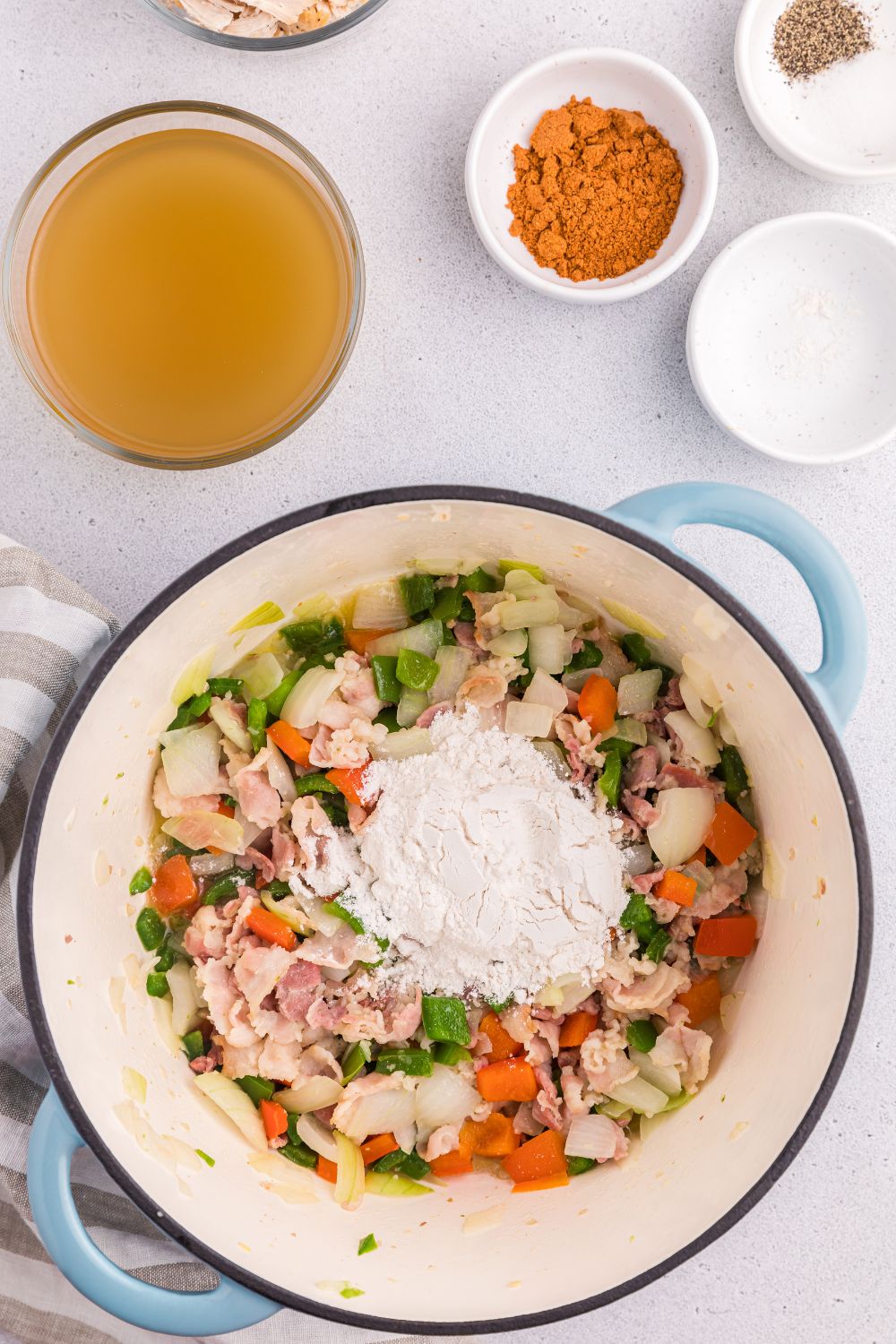 cornstarch on table with veggies and chicekn on the table