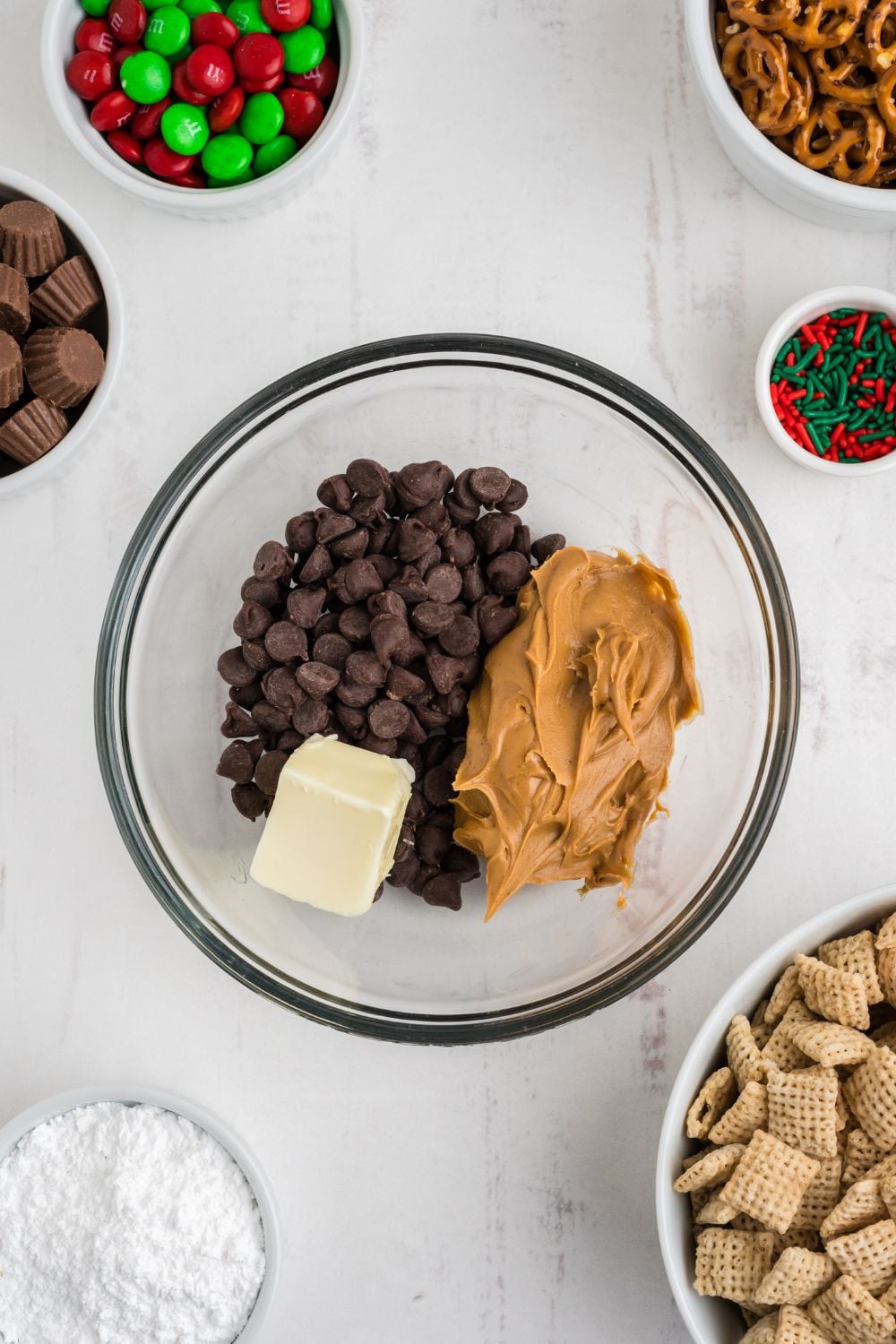chocolate, peanut butter, and butter in a glass bowl