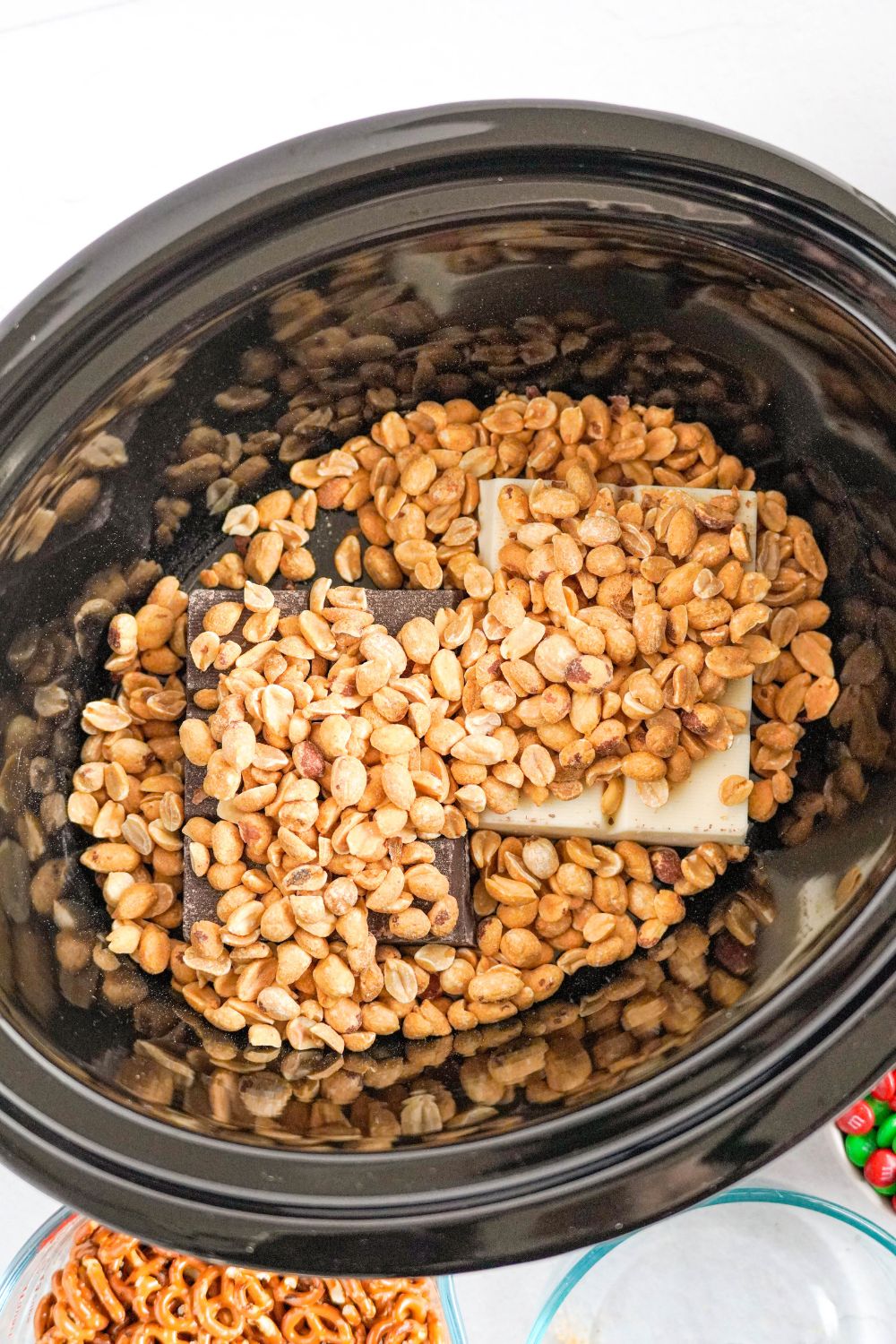 chocolate with nuts poured over the top of it