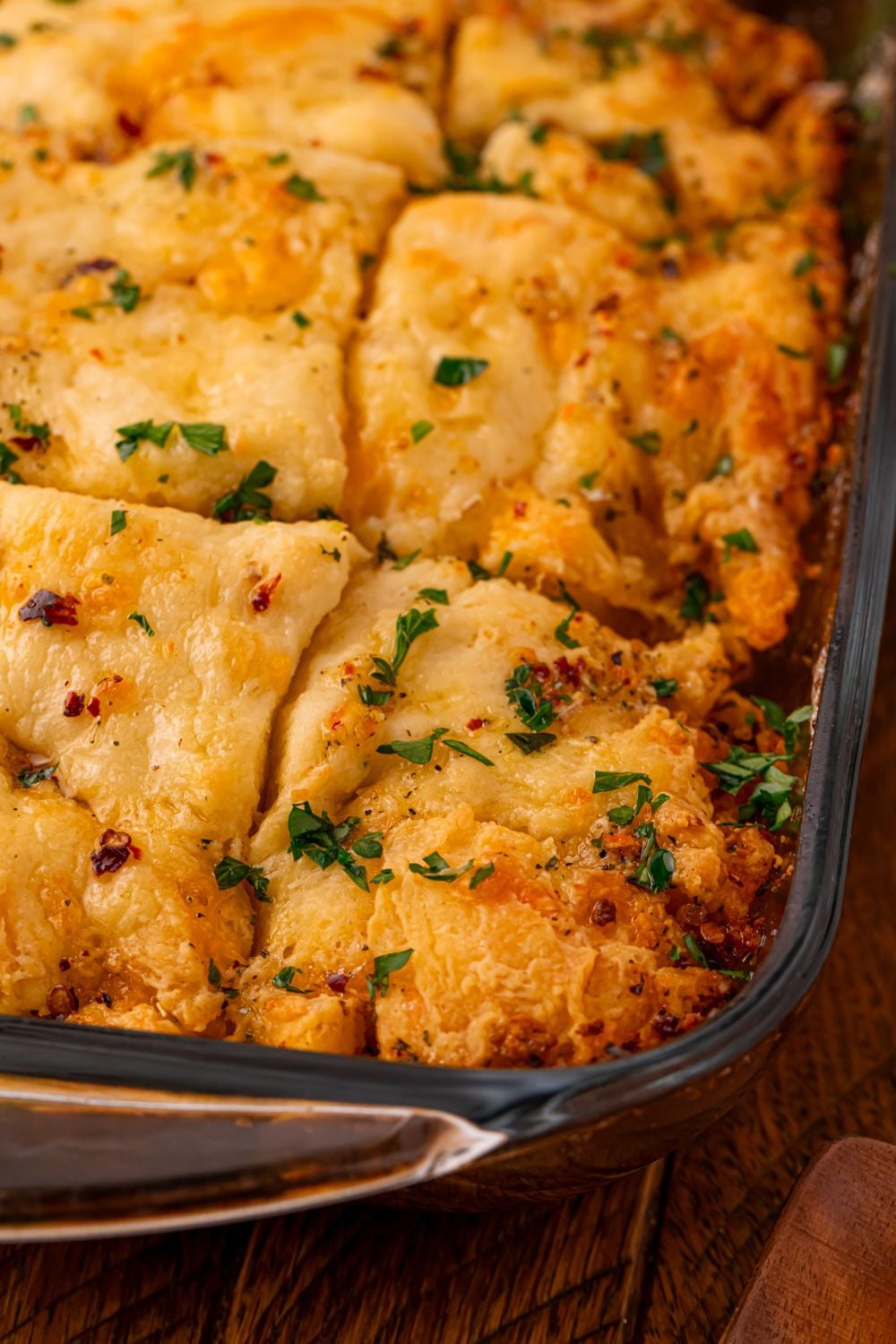 Cowboy Butter Swim Biscuits in a glass pan on the table