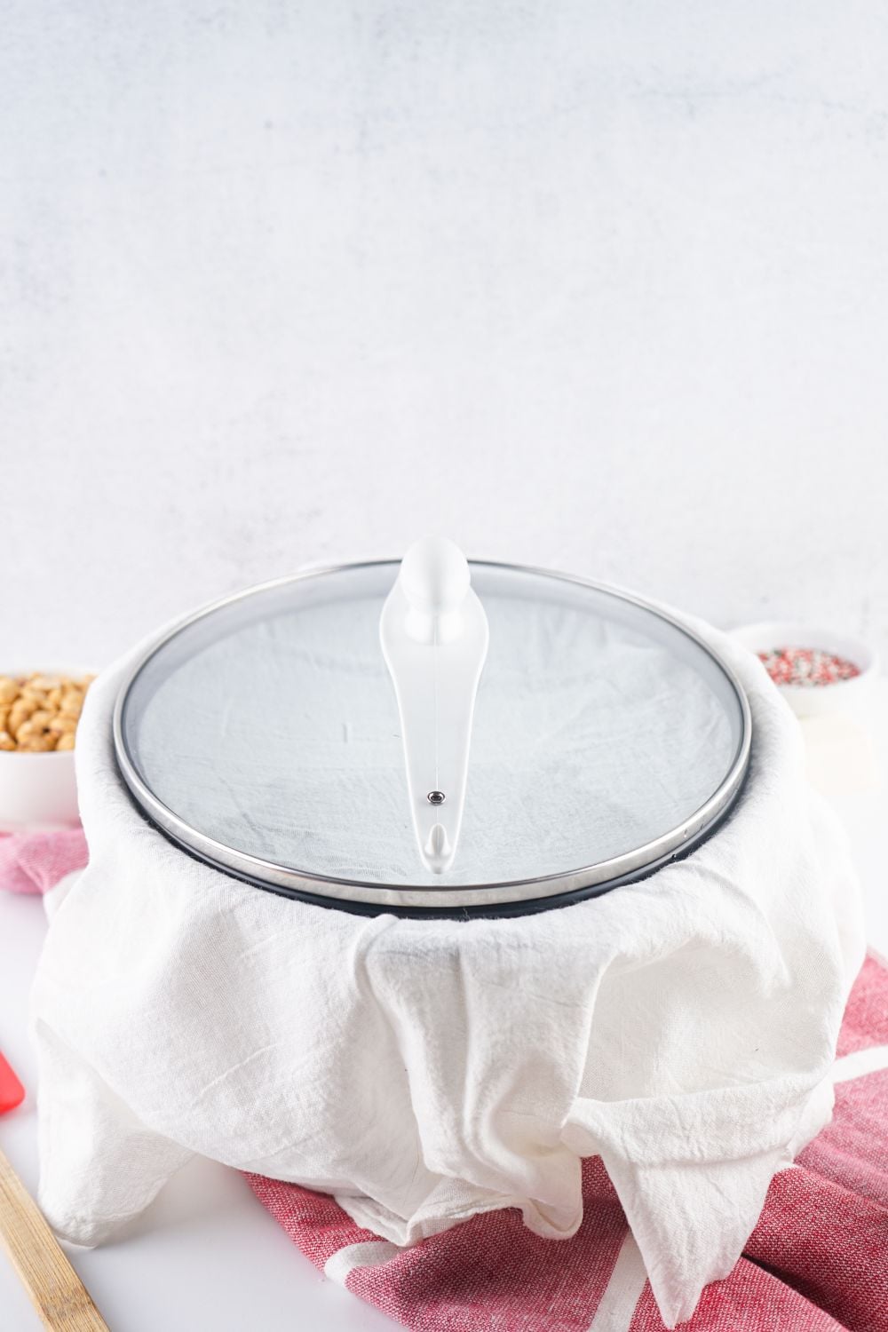 crockpot on table with a towel over it