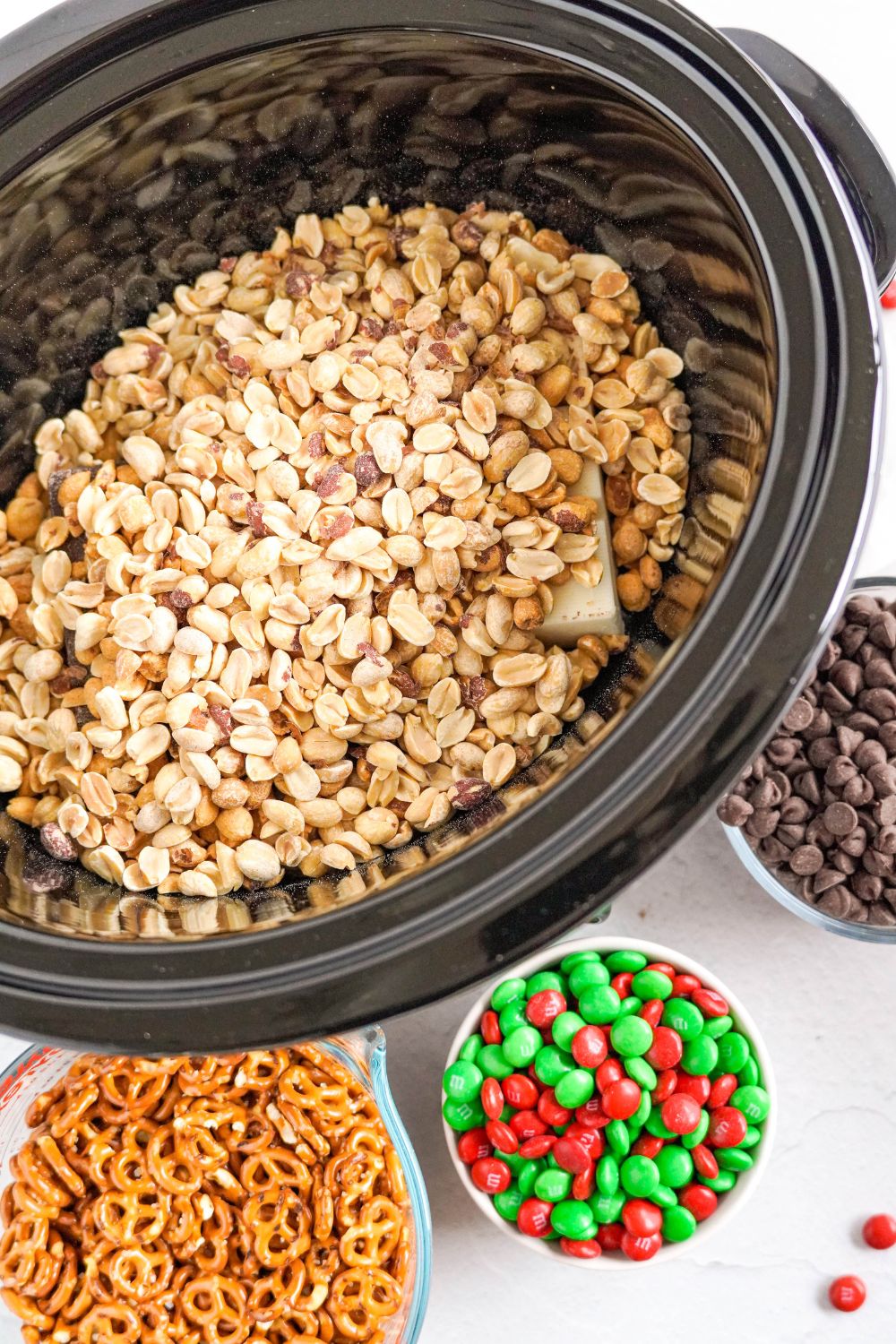 peanuts and chocolate in a slow cooker