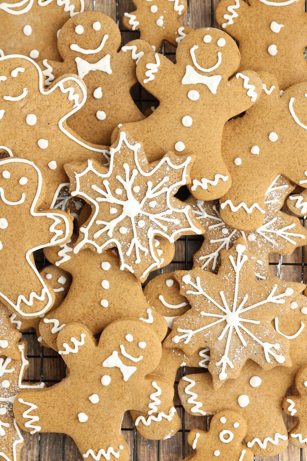 Christmas gingerbread cookies scattered all over the table 