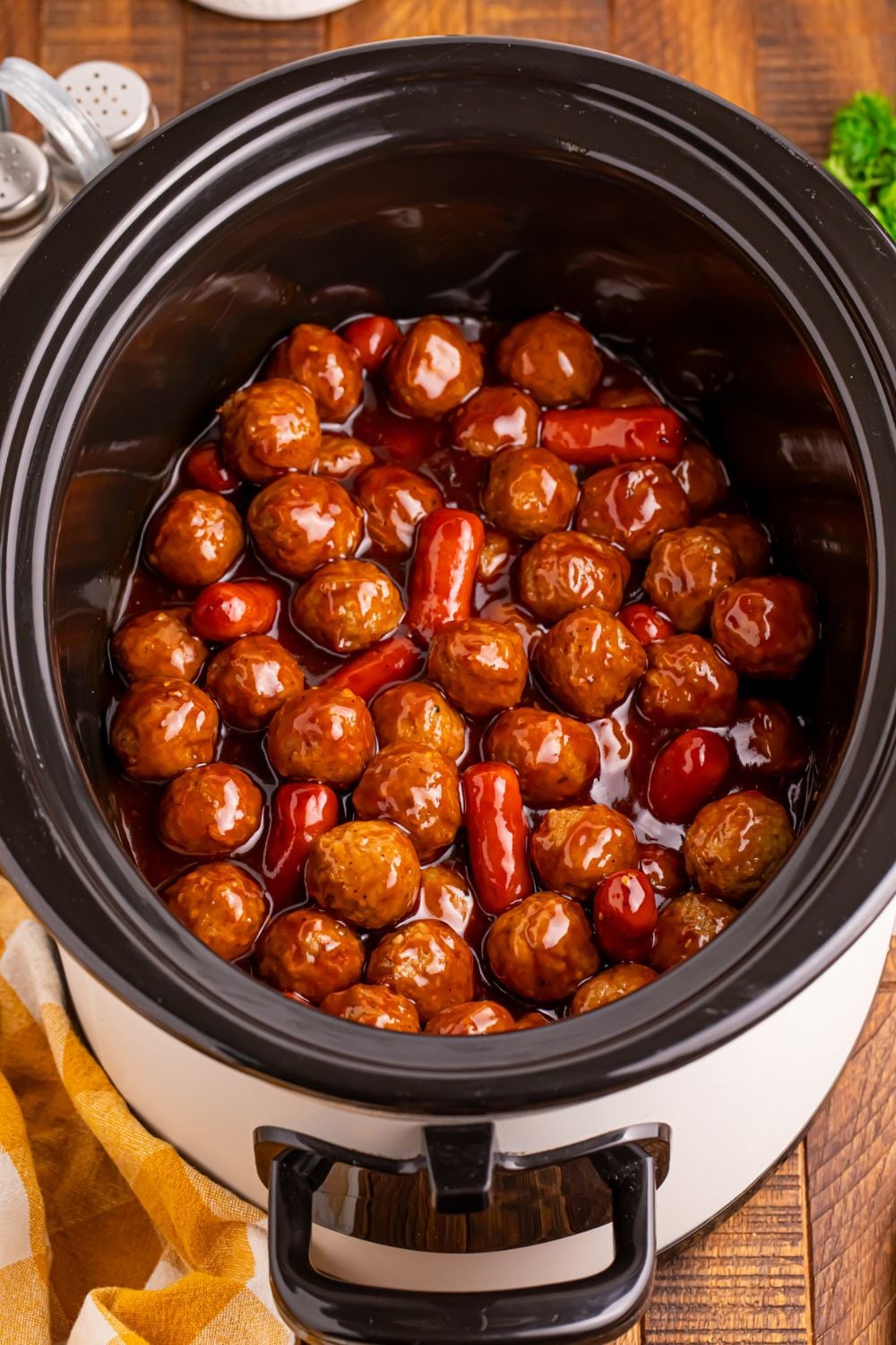 Crockpot Teriyaki BBQ Cocktail Meatballs & Lil Smokies in a crockpot all cooked and ready to be served 
