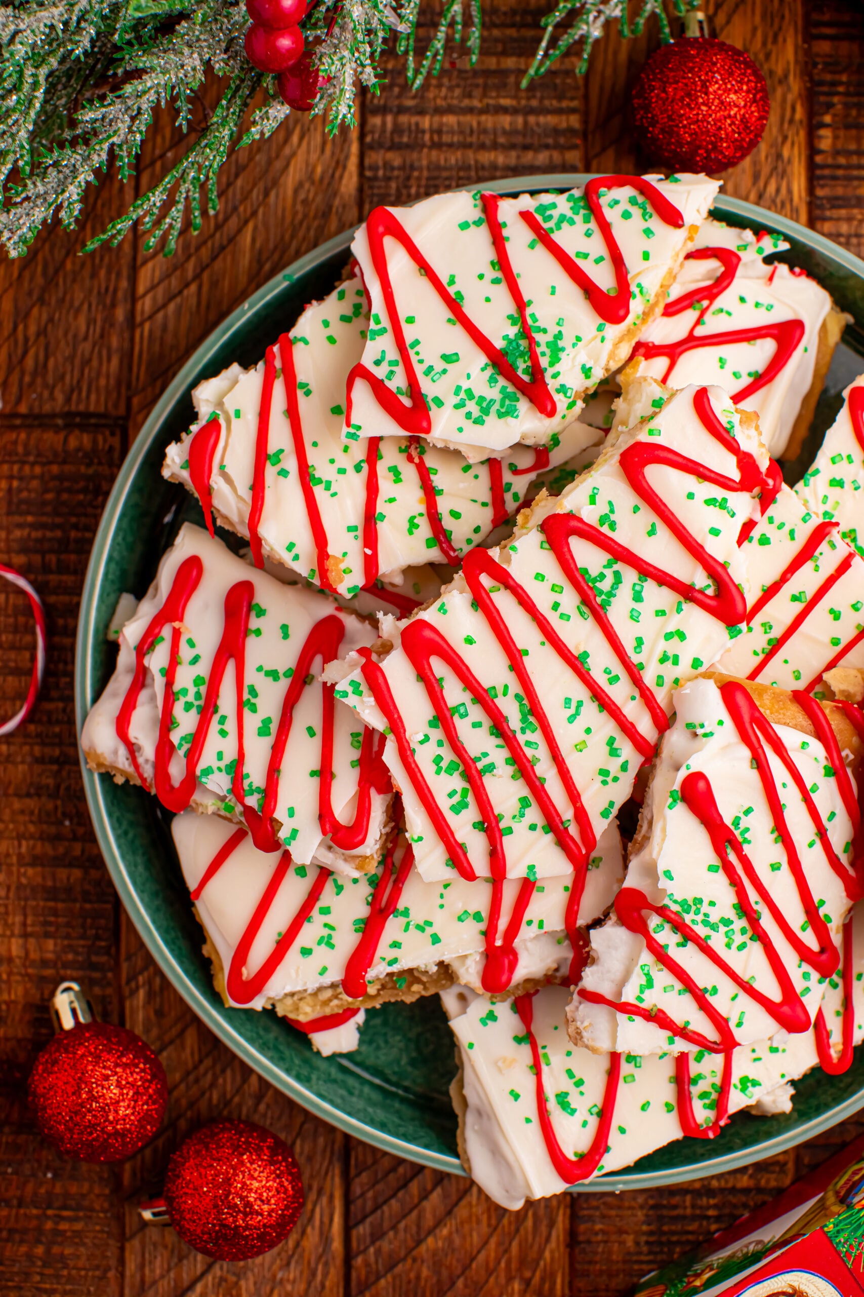 Close up overhead photo of Christmas Tree Crack piled on a green serving platter