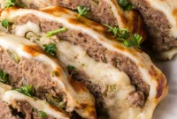 Cheesy Philly Stuffed Meatloaf with Peppers and Onions