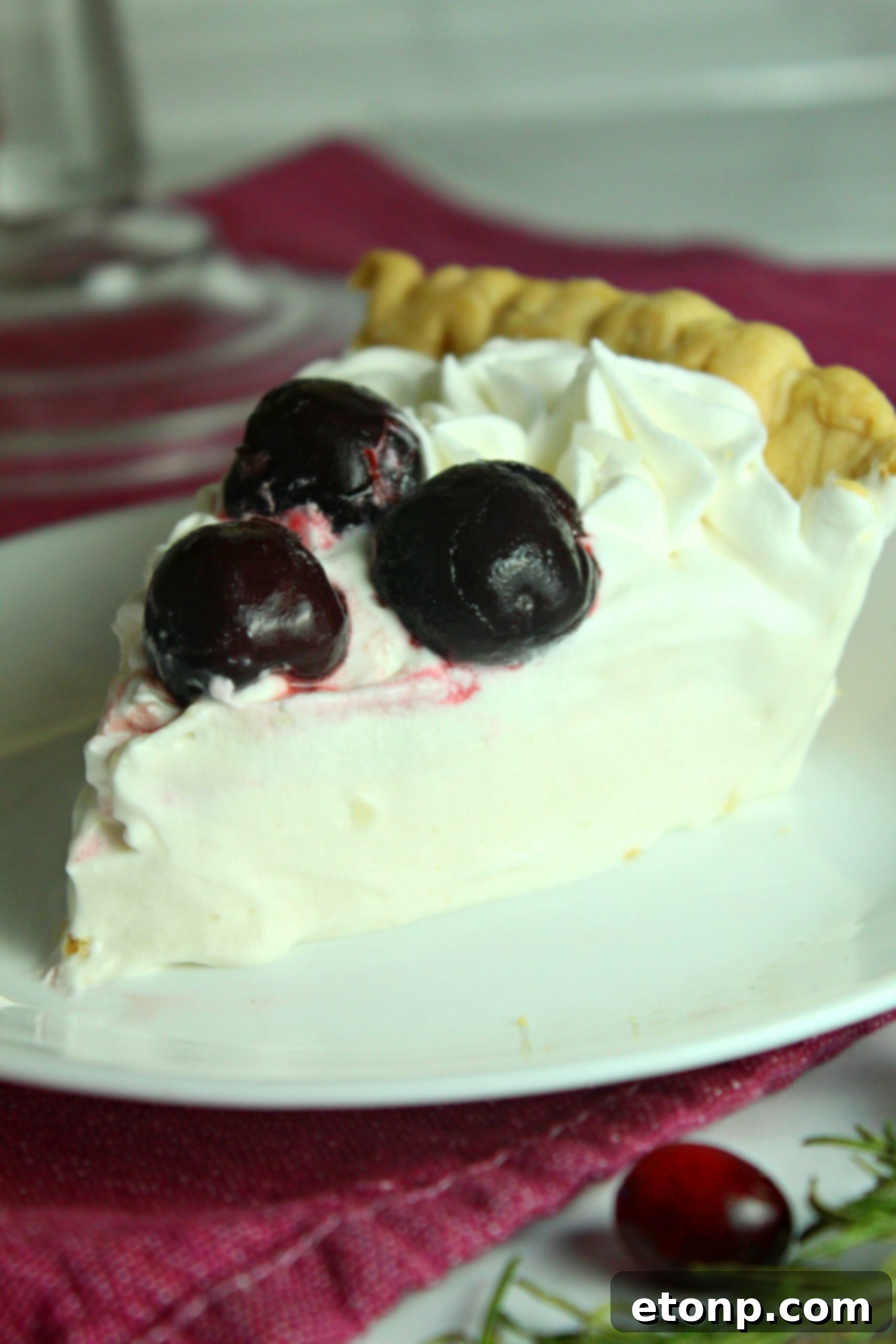 Close-up of the creamy, fluffy filling of the White Christmas Pie, showcasing its delicate texture before being topped, highlighting the fresh ingredients.