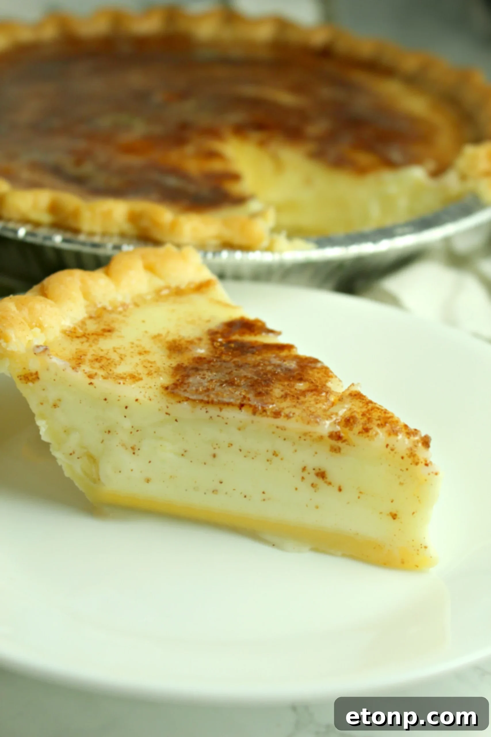 Multiple slices of Sugar Cream Pie on a serving platter