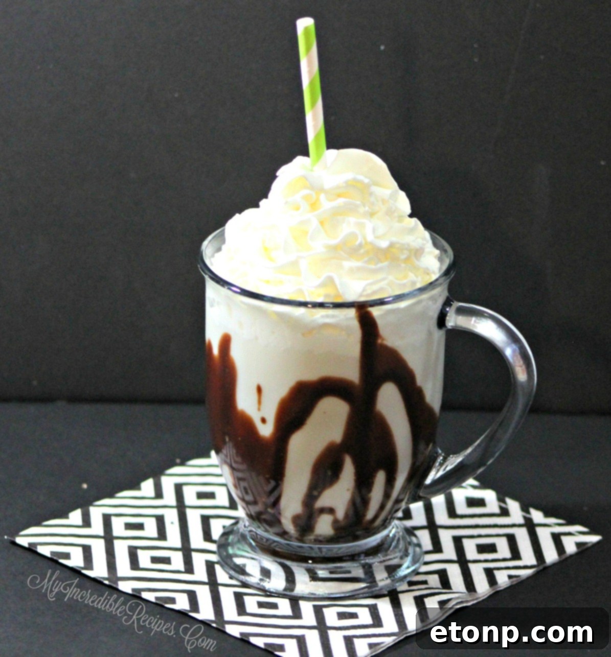 Close-up of White Hot Chocolate with Oreo Cream, showing its rich texture and topping