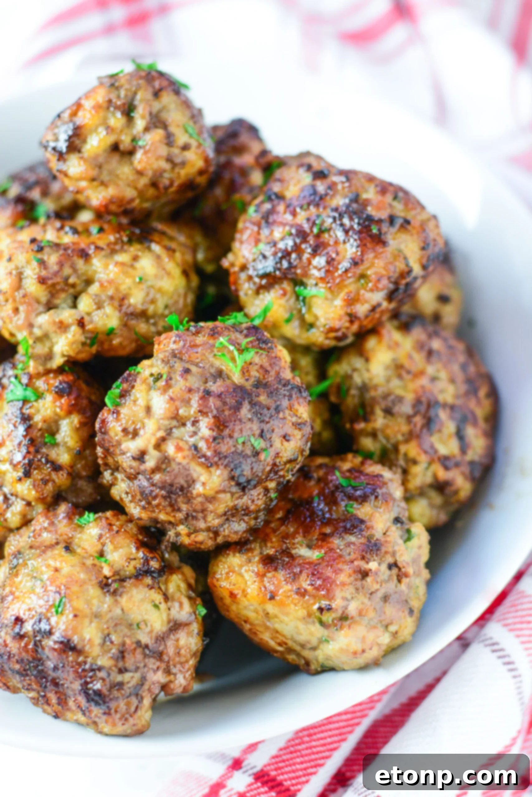Grandma's Baked Italian Meatballs 5 A freshly made, crustless Italian bread soaking in milk in a bowl, a key ingredient for moist meatballs.