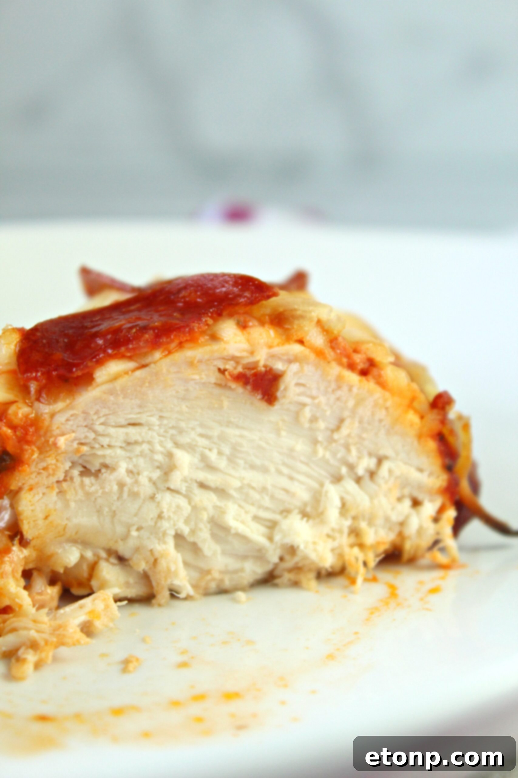 Slow Cooker Pizza Chicken, shredded and mixed with toppings