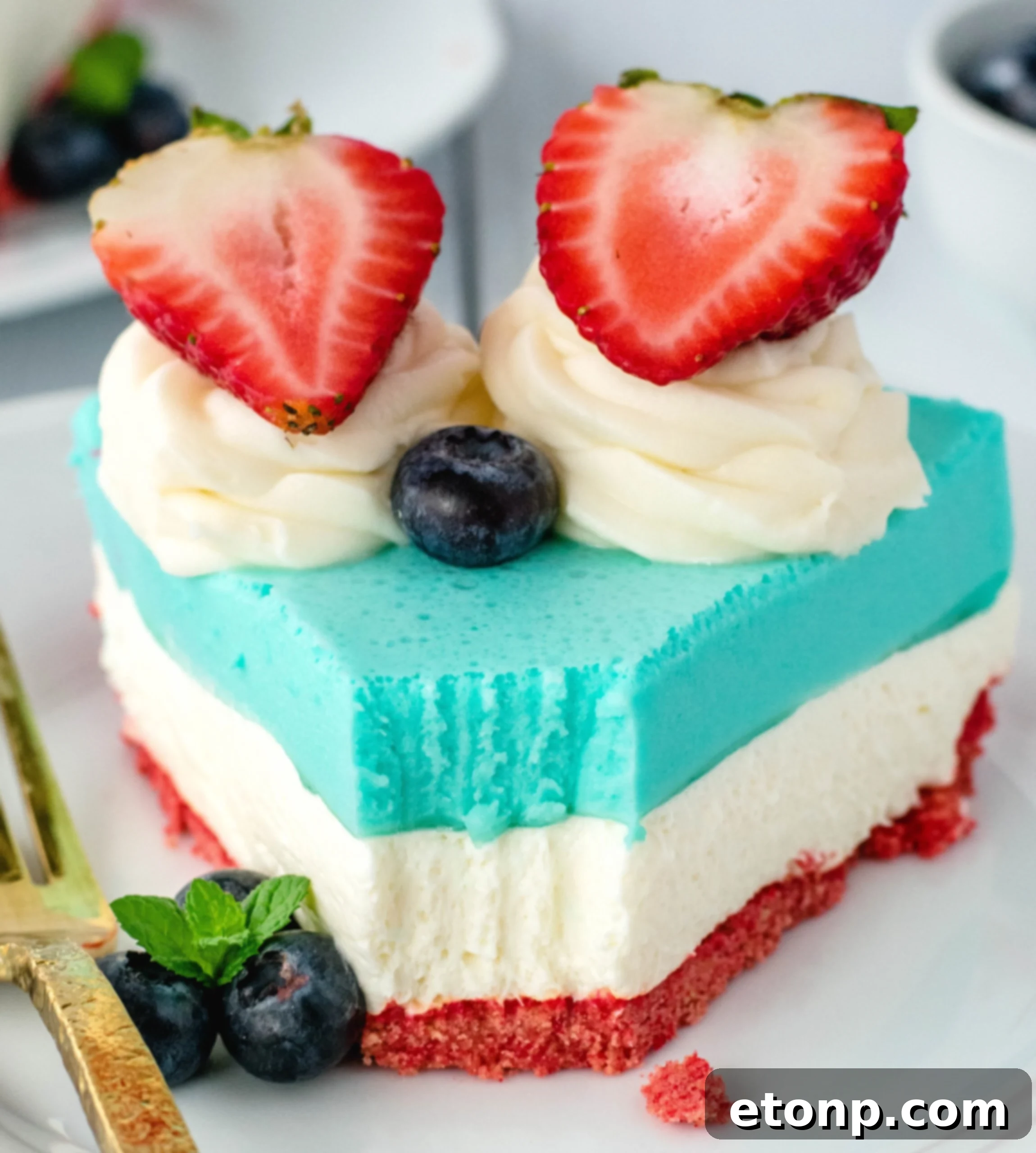 Gorgeous No-Bake Patriotic Cheesecake with red, white, and blue layers