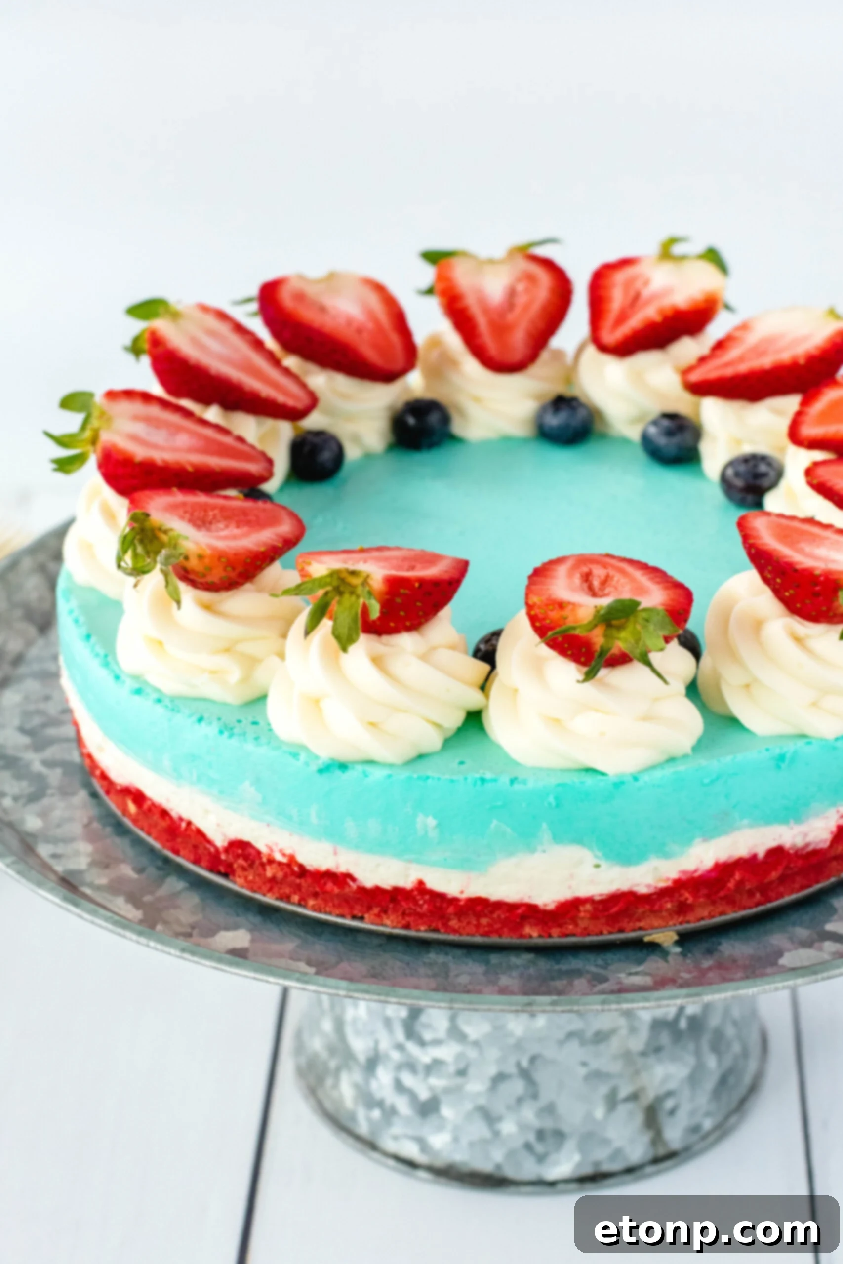 Close-up of creamy No-Bake Patriotic Cheesecake slice