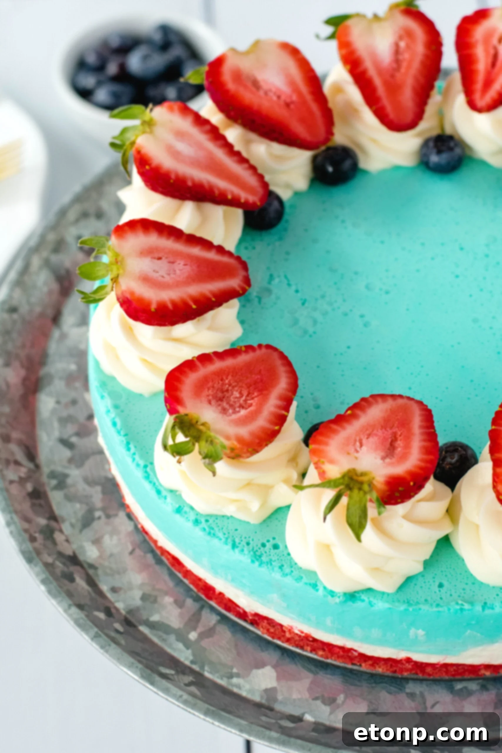 Beautifully presented slice of No-Bake Patriotic Cheesecake