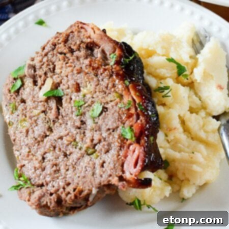 Candied Bacon Wrapped Meatloaf, a delicious and moist dish.
