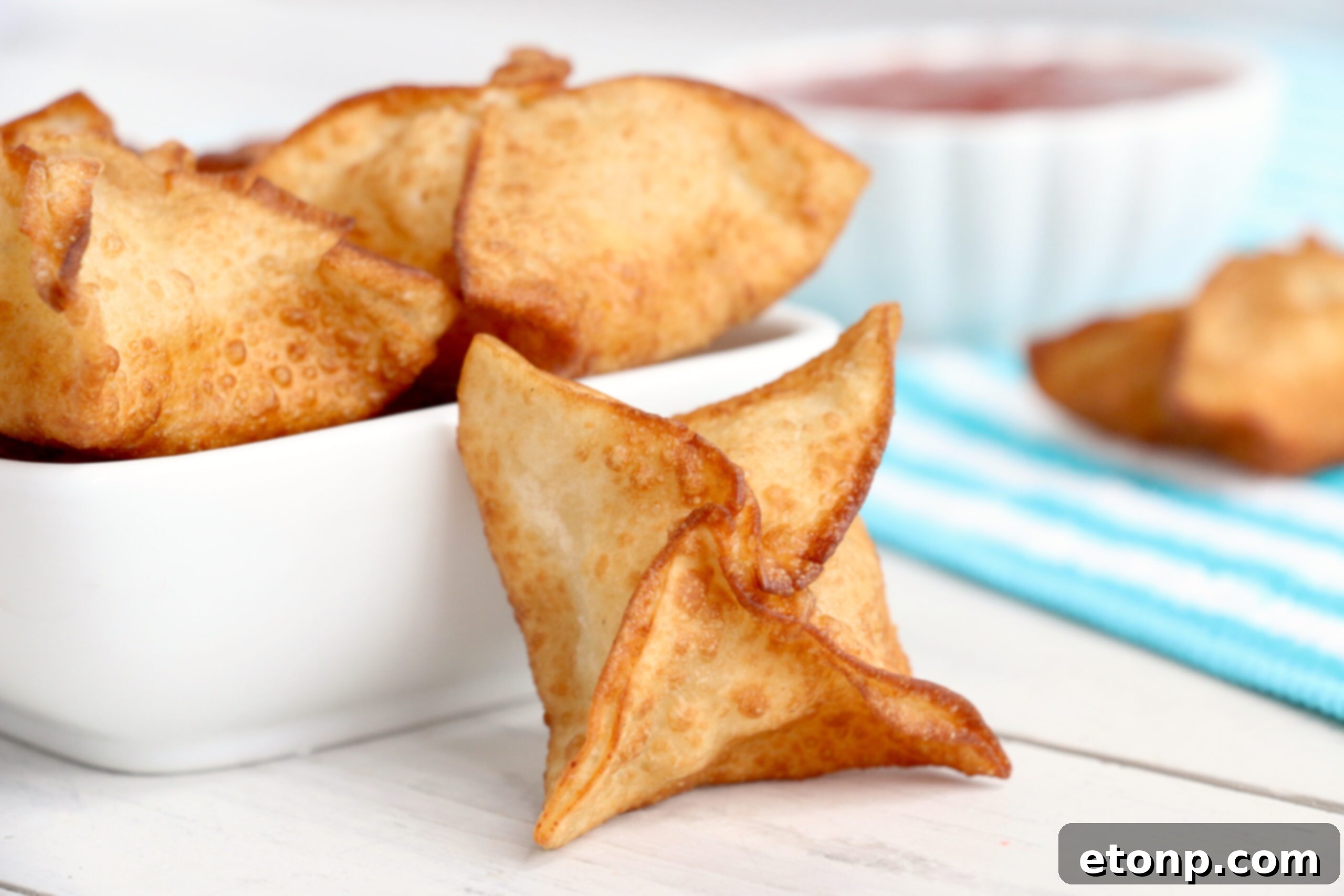 Crispy Cream Cheese Crab Bites 8 Crab Rangoons served with a side of sweet and sour sauce