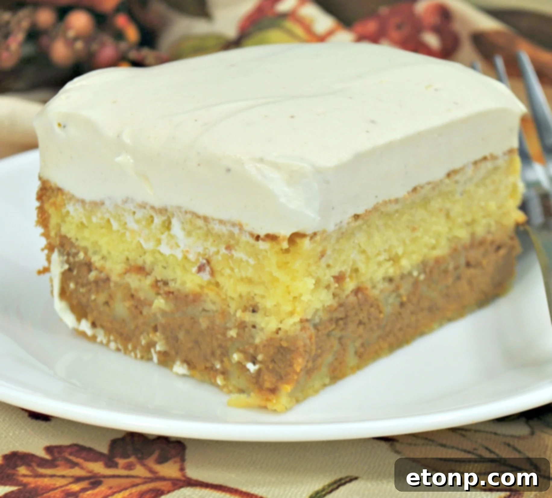 Enchanted Harvest Pumpkin Cake 2 Delicious Pumpkin Magic Cake with creamy vanilla cream cheese frosting, perfect for fall