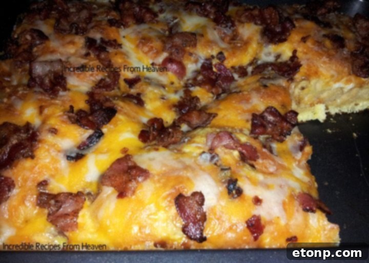 Perfect Sunday Bacon, Egg, and Cheese Biscuit Bake 5 Close-up shot of crispy bacon in the breakfast bake