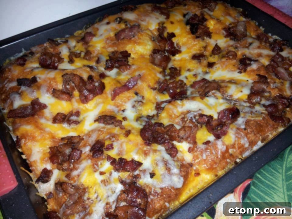 Perfect Sunday Bacon, Egg, and Cheese Biscuit Bake 6 A slice of the cheesy, bacony, eggy biscuit bake
