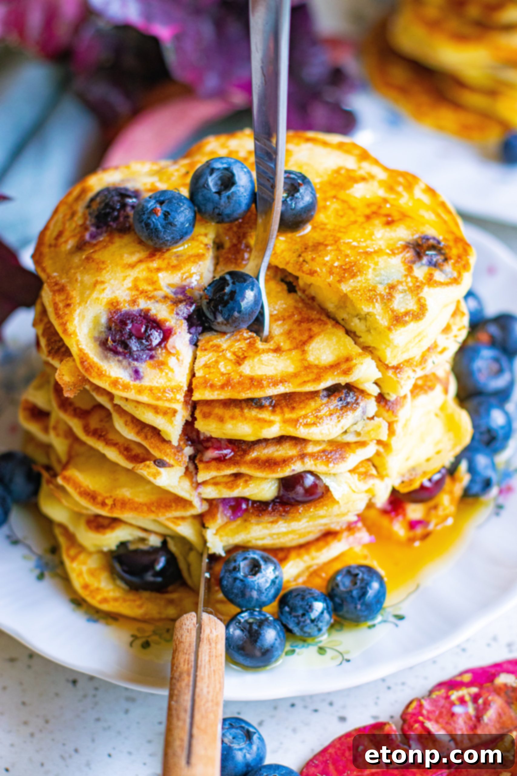 Ingredients for blueberry cream cheese pancakes laid out on a table