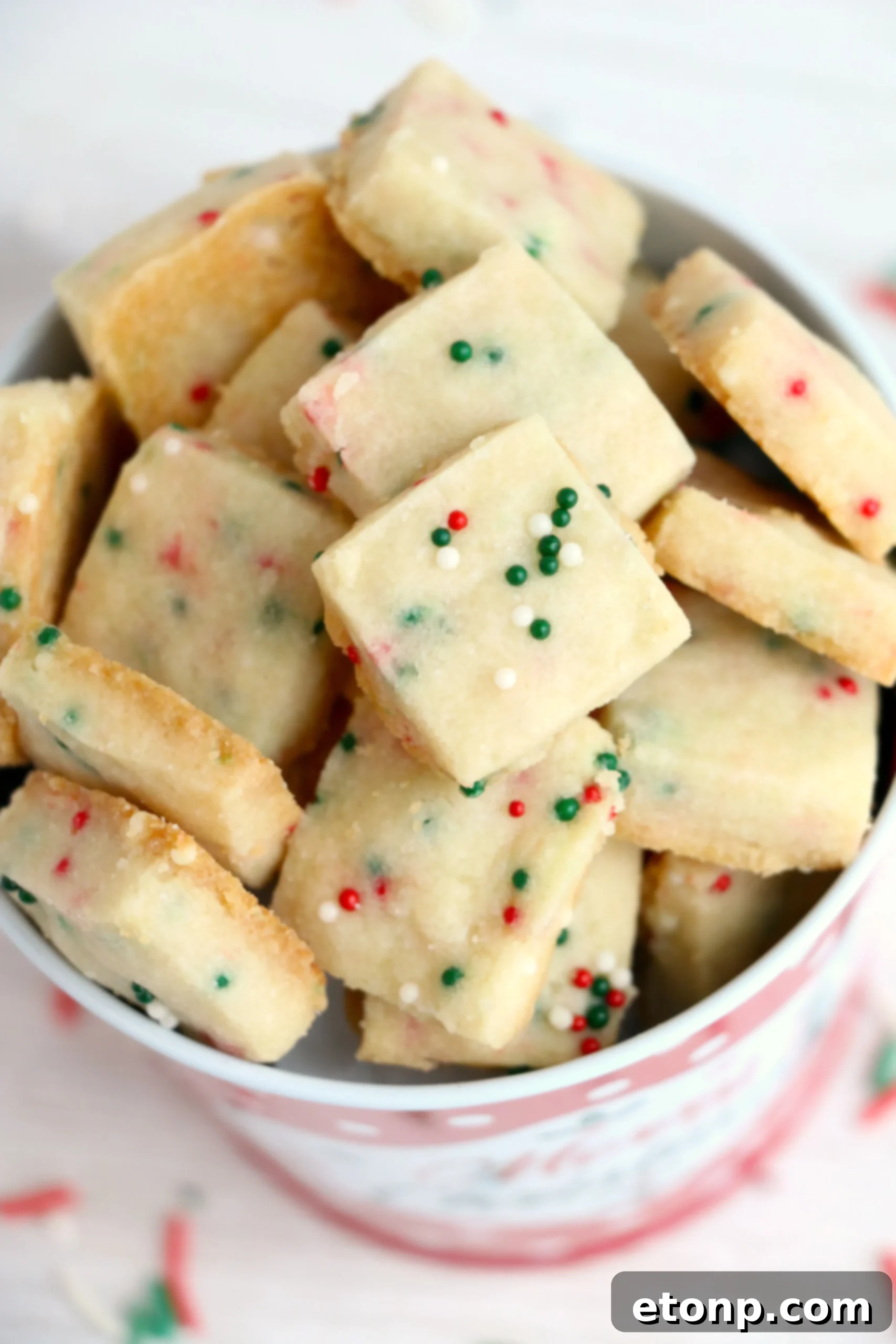 An array of Christmas Shortbread Cookie Bites arranged artistically on a platter.
