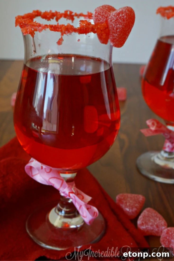Couple enjoying Red Hot Love cocktails on Valentine's Day