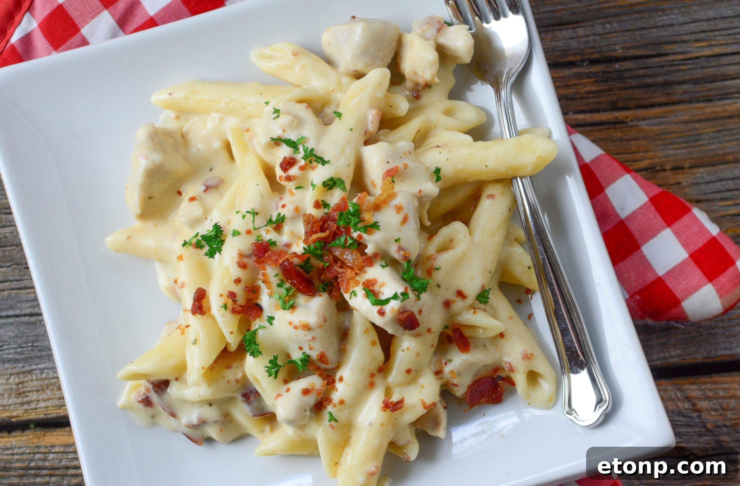 A close-up of a pot of Instant Pot Crack Chicken Pasta, showcasing the creamy texture and melted cheese.