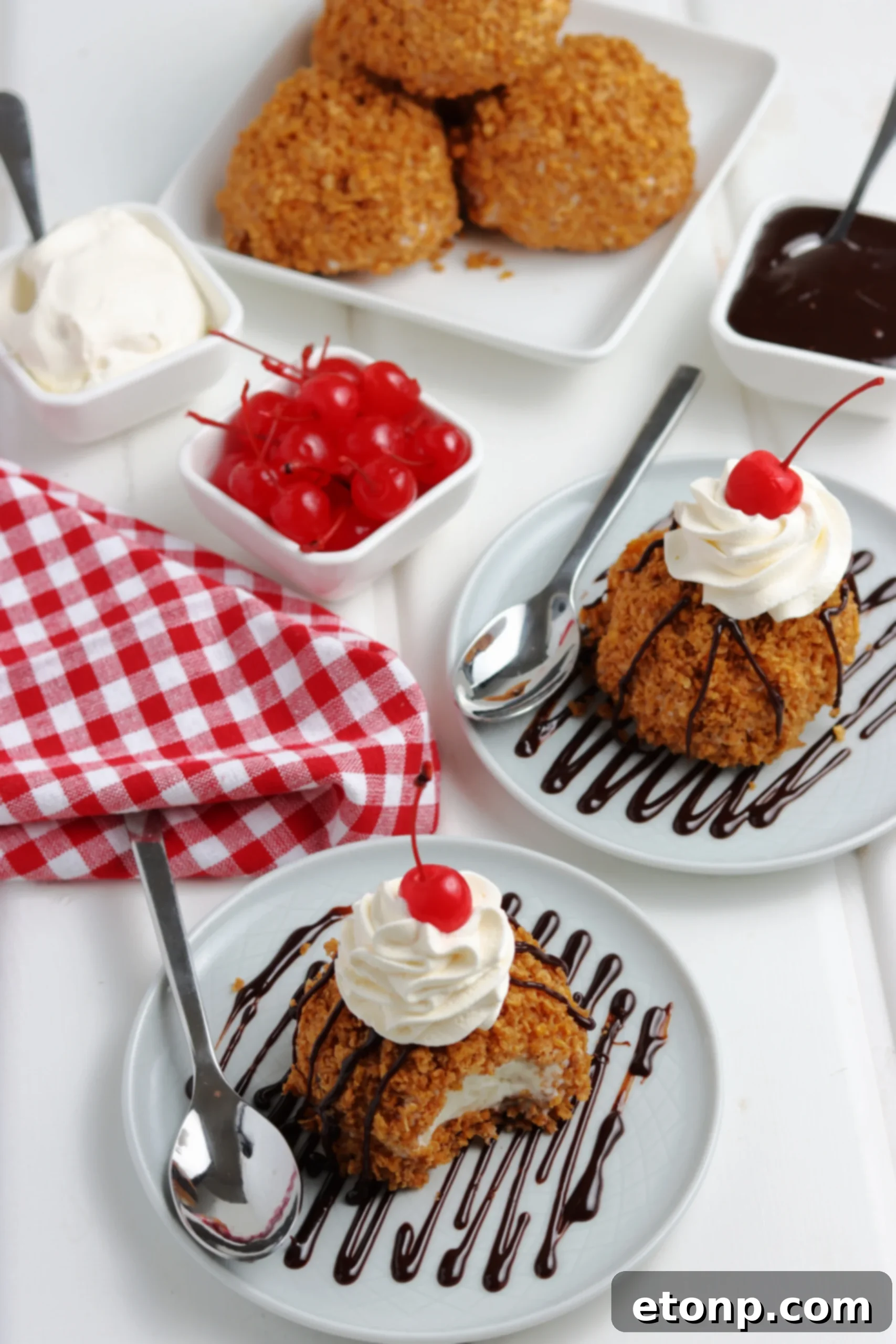 Crispy Fried Ice Cream Delight 5 A scoop of ice cream being rolled in a bowl of crushed cereal coating.