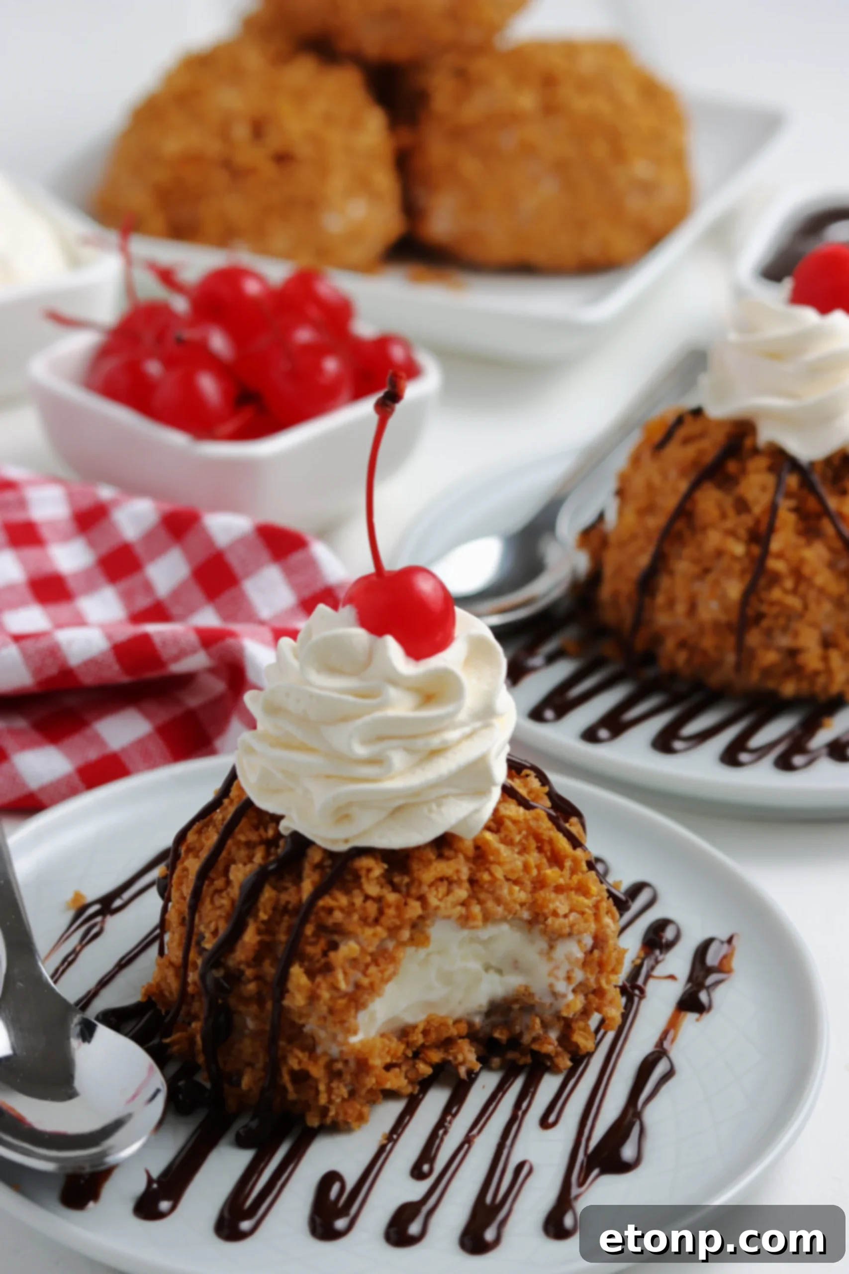 Crispy Fried Ice Cream Delight 6 Several neatly coated ice cream balls arranged on a parchment-lined baking sheet, ready for freezing.