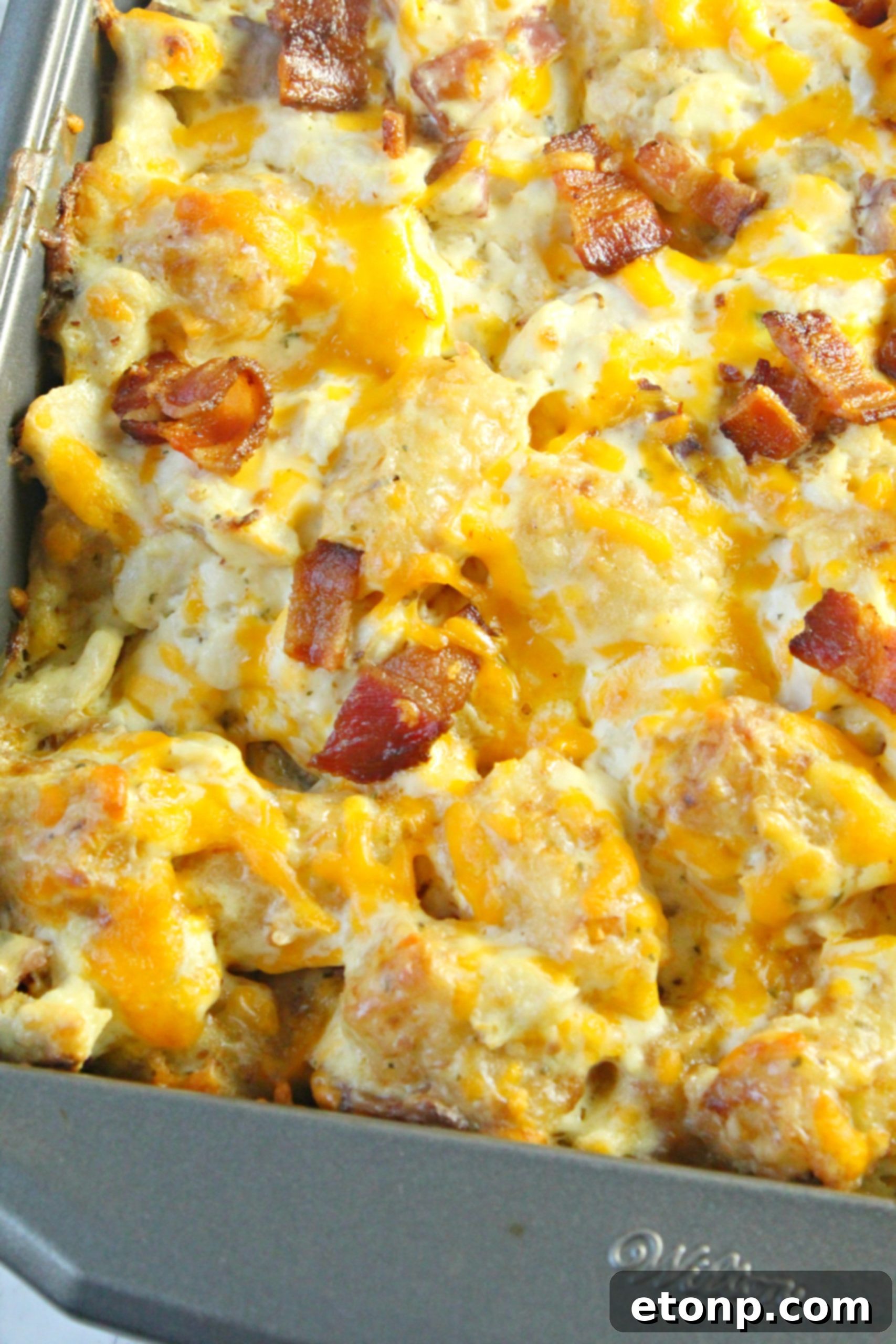 A wide shot of the Cracked Out Chicken Tater Tot Casserole, showcasing its golden topping and inviting aroma.