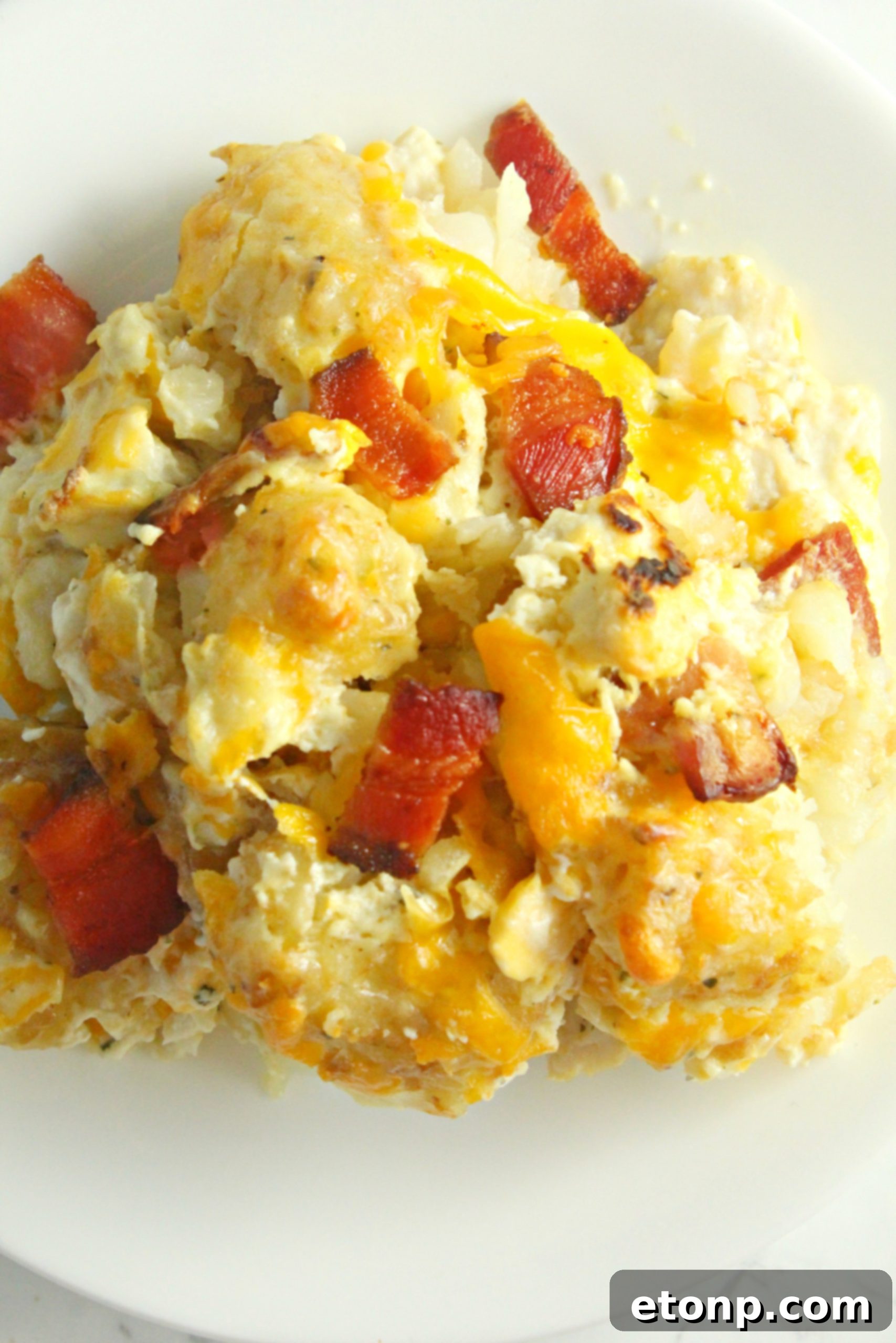 Cooked chicken pieces, ready to be added to the casserole mixture, highlighting preparation flexibility.