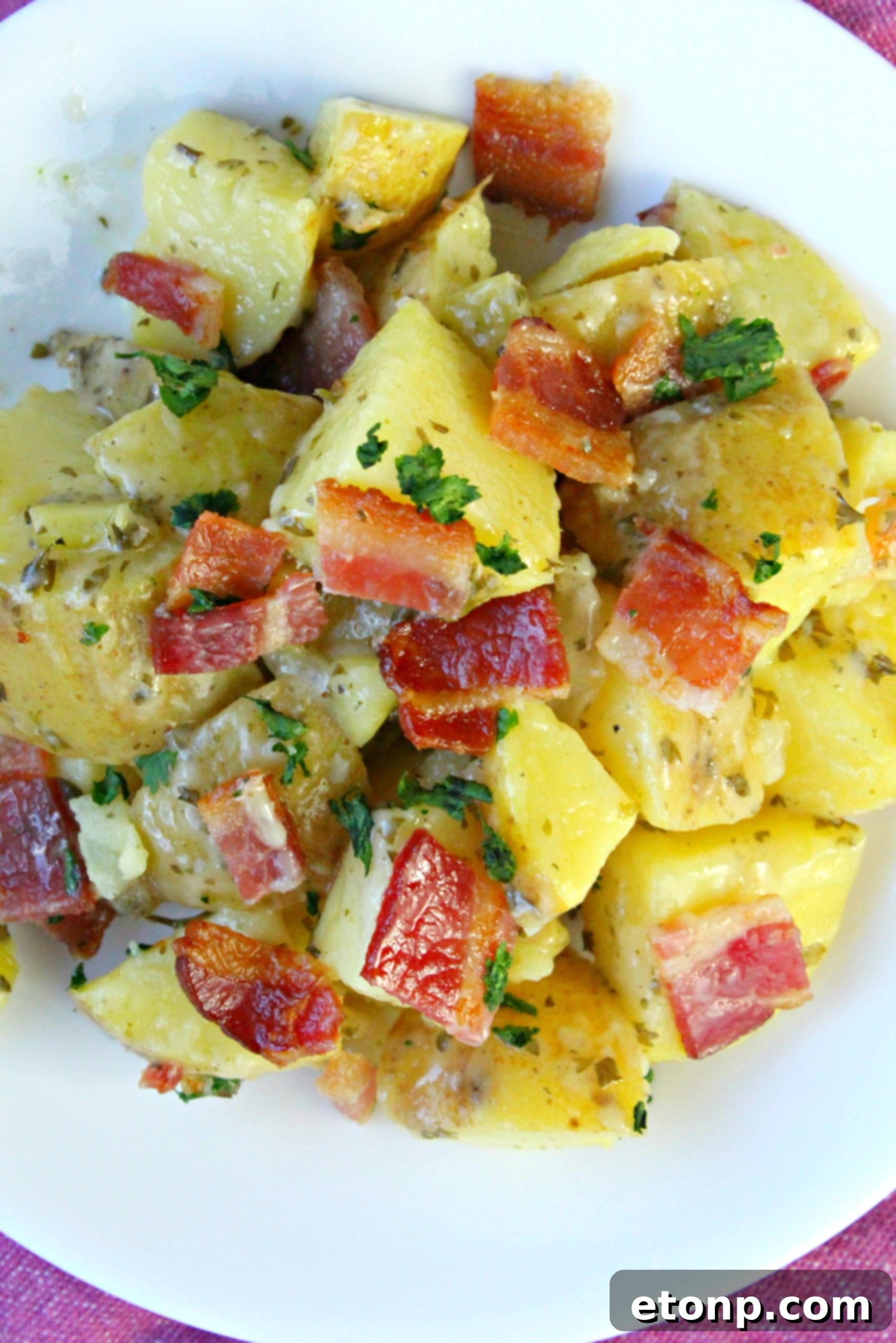 Freshly prepared German Potato Salad in a rustic bowl, ready for plating