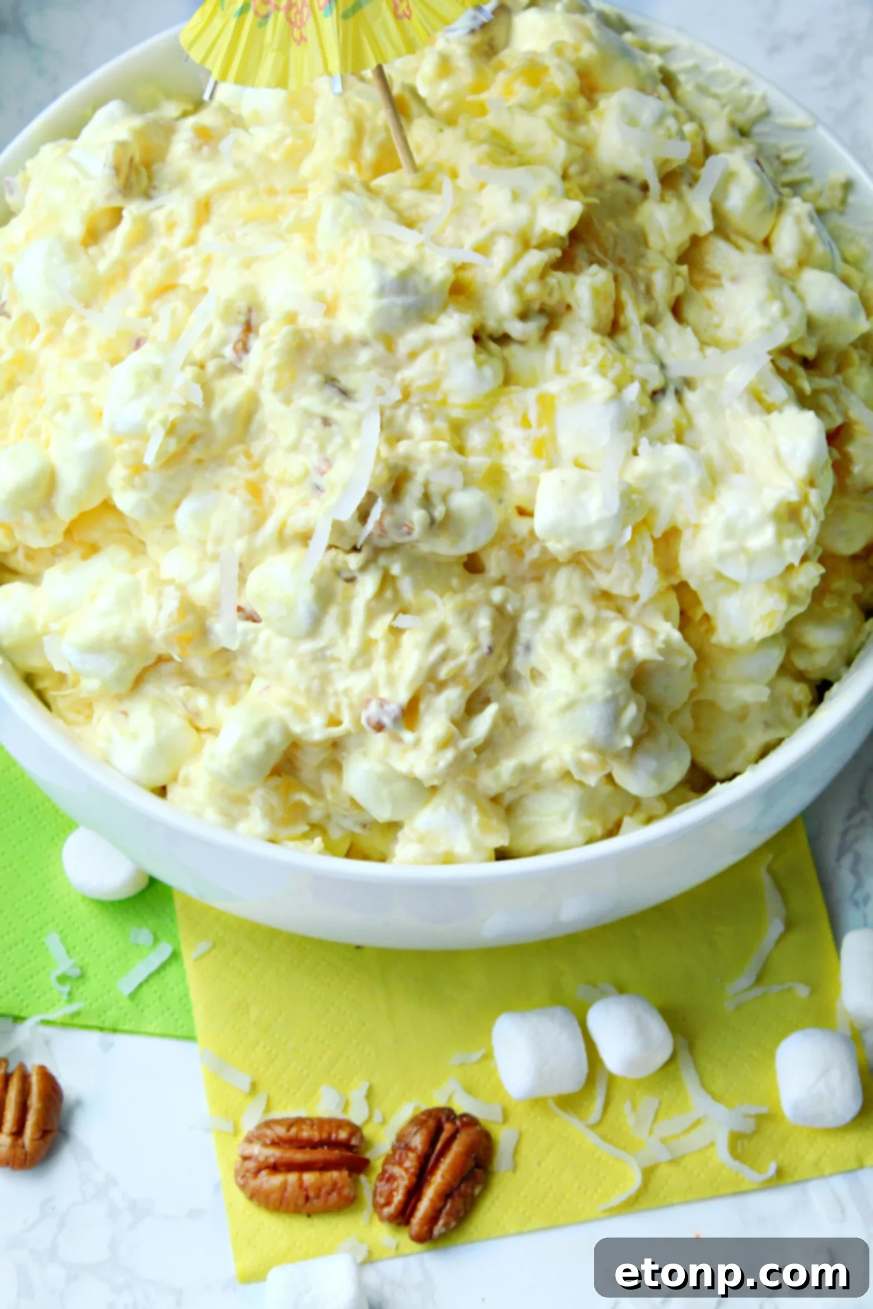 A final, beautifully plated serving of Pina Colada Fluff, garnished and ready to be enjoyed.