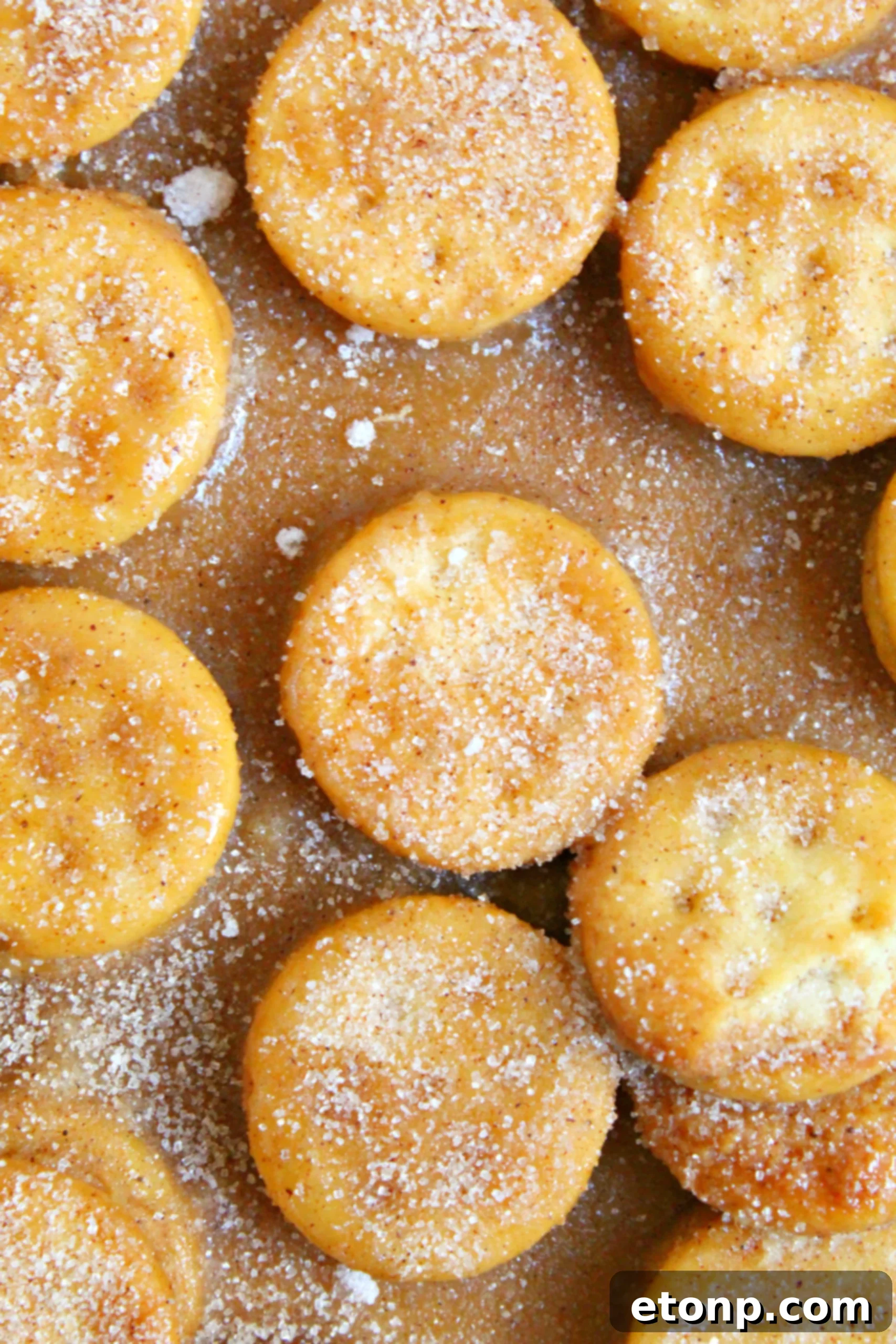 Melted butter and brown sugar simmering in a saucepan.