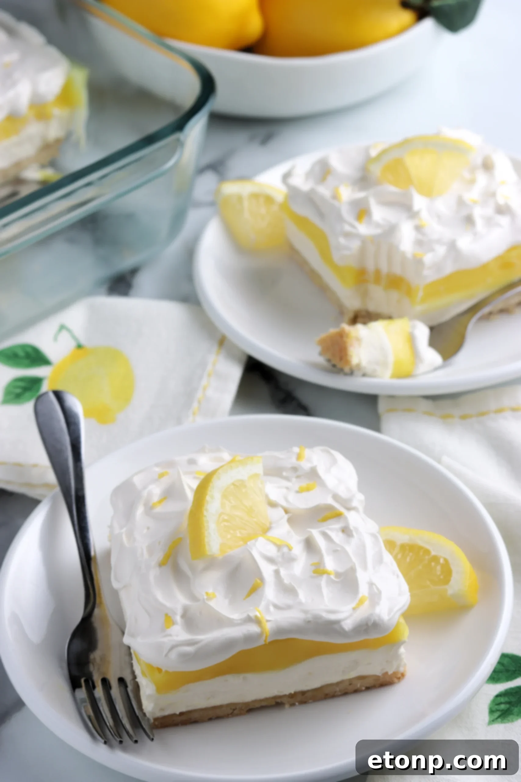 A dollop of whipped cream with a sprig of mint, showcasing the creamy top layer ingredient.