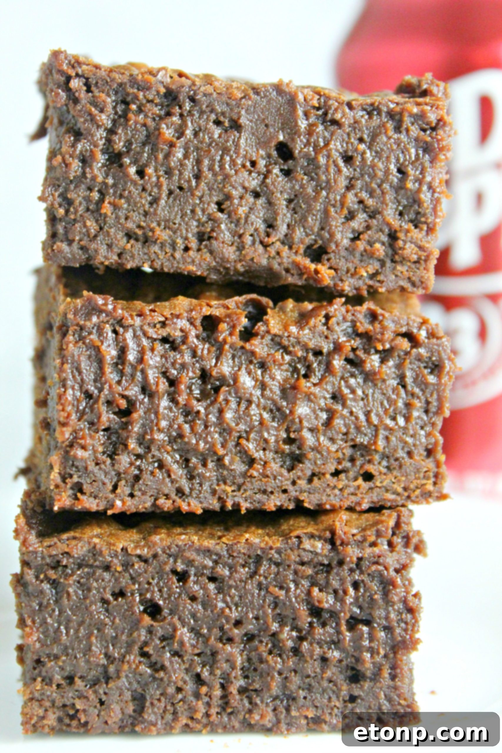 Decadent Dr Pepper Brownies 7 A selection of Dr. Pepper soda cans, including classic, diet, and cherry flavors