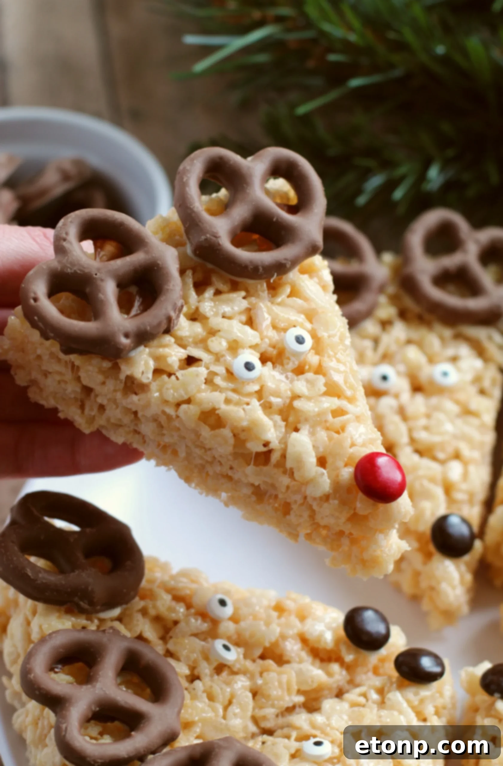 A close-up of a pile of white mini marshmallows, essential for gooey Rice Krispie Treats.