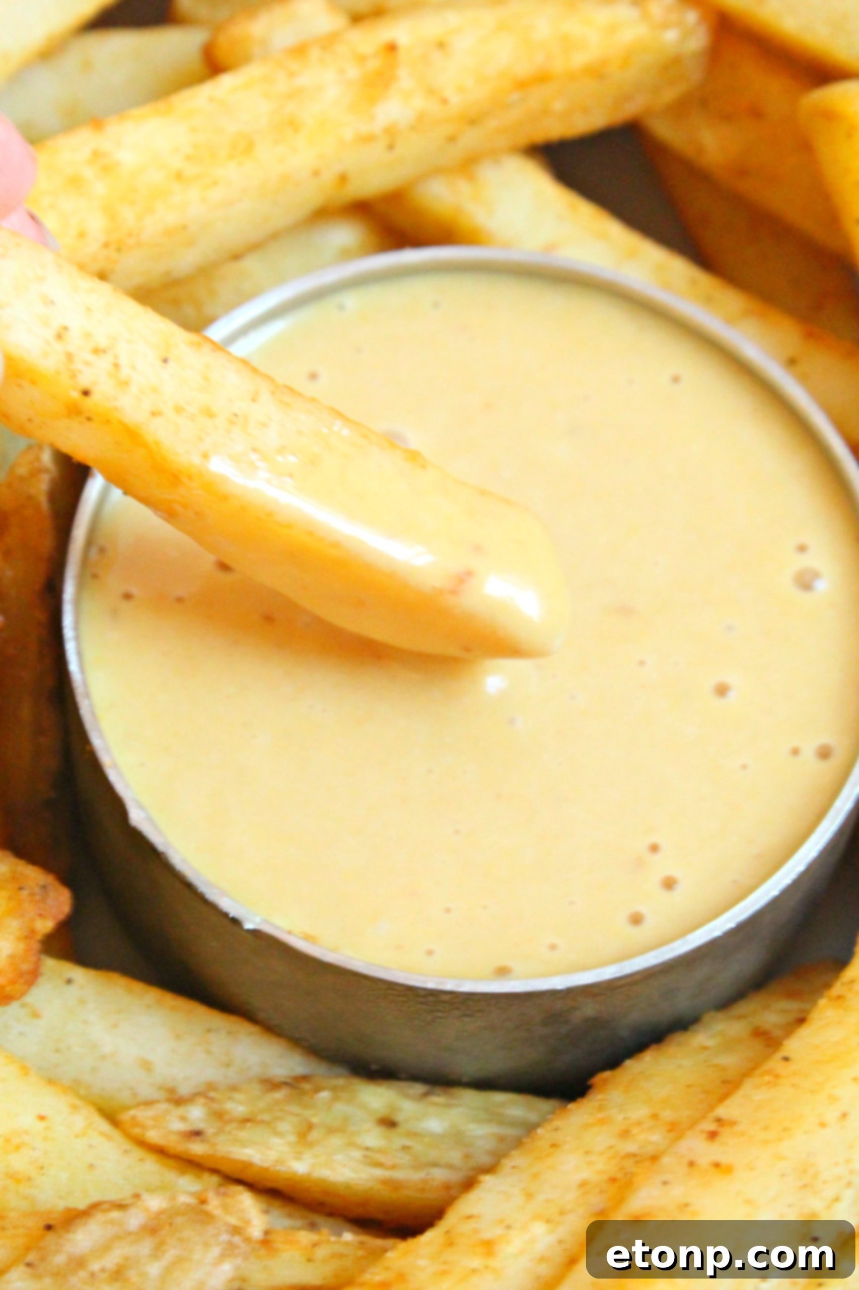 Crack the Chick-Fil-A Sauce Code 2 Homemade Chick-fil-A Sauce in a bowl with chicken nuggets and waffle fries
