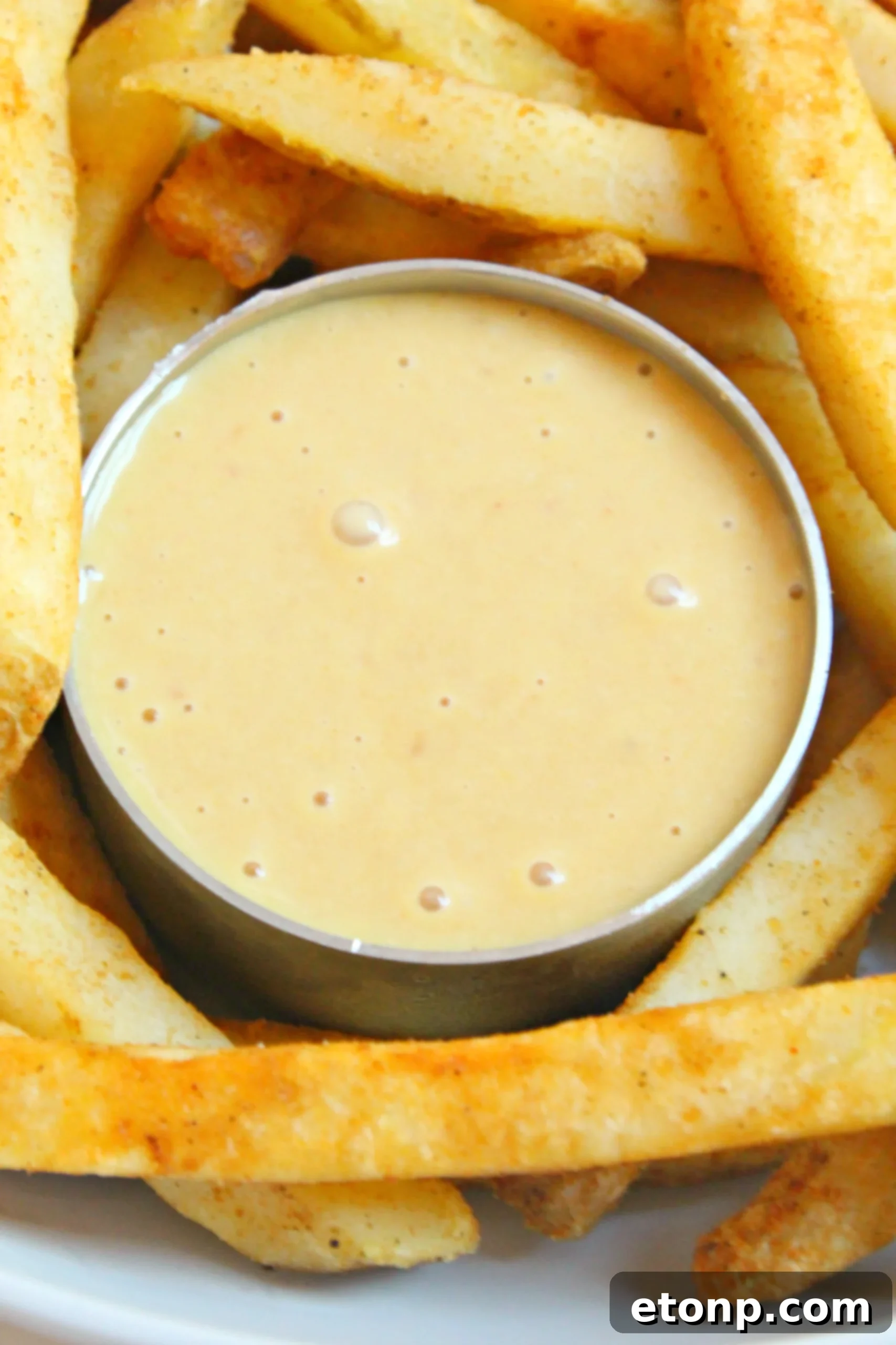 Crack the Chick-Fil-A Sauce Code 7 Homemade Chick-fil-A Sauce in a bowl with a spoon