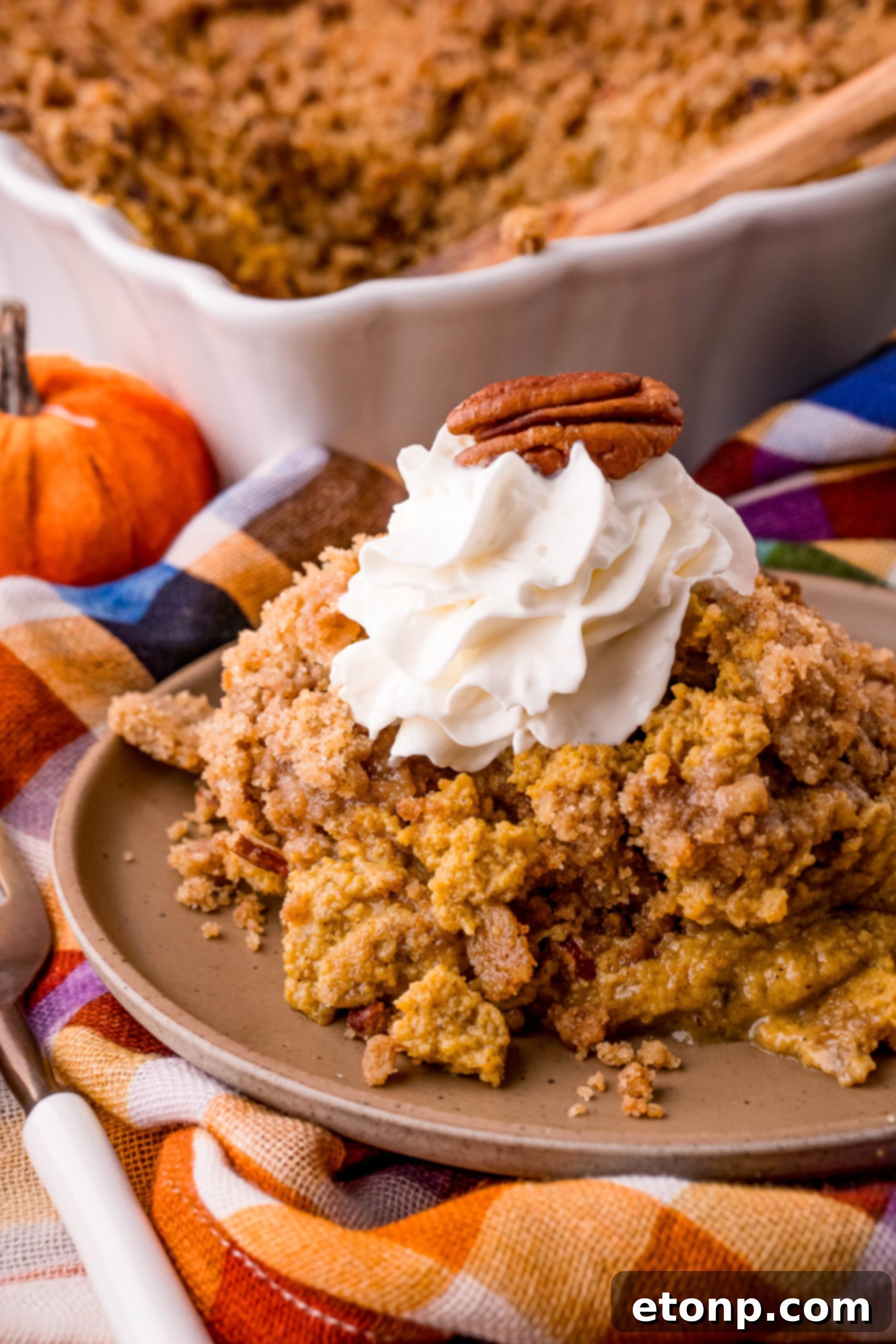 Pumpkin Pie Crisp baking in the oven, filling the kitchen with a wonderful aroma.