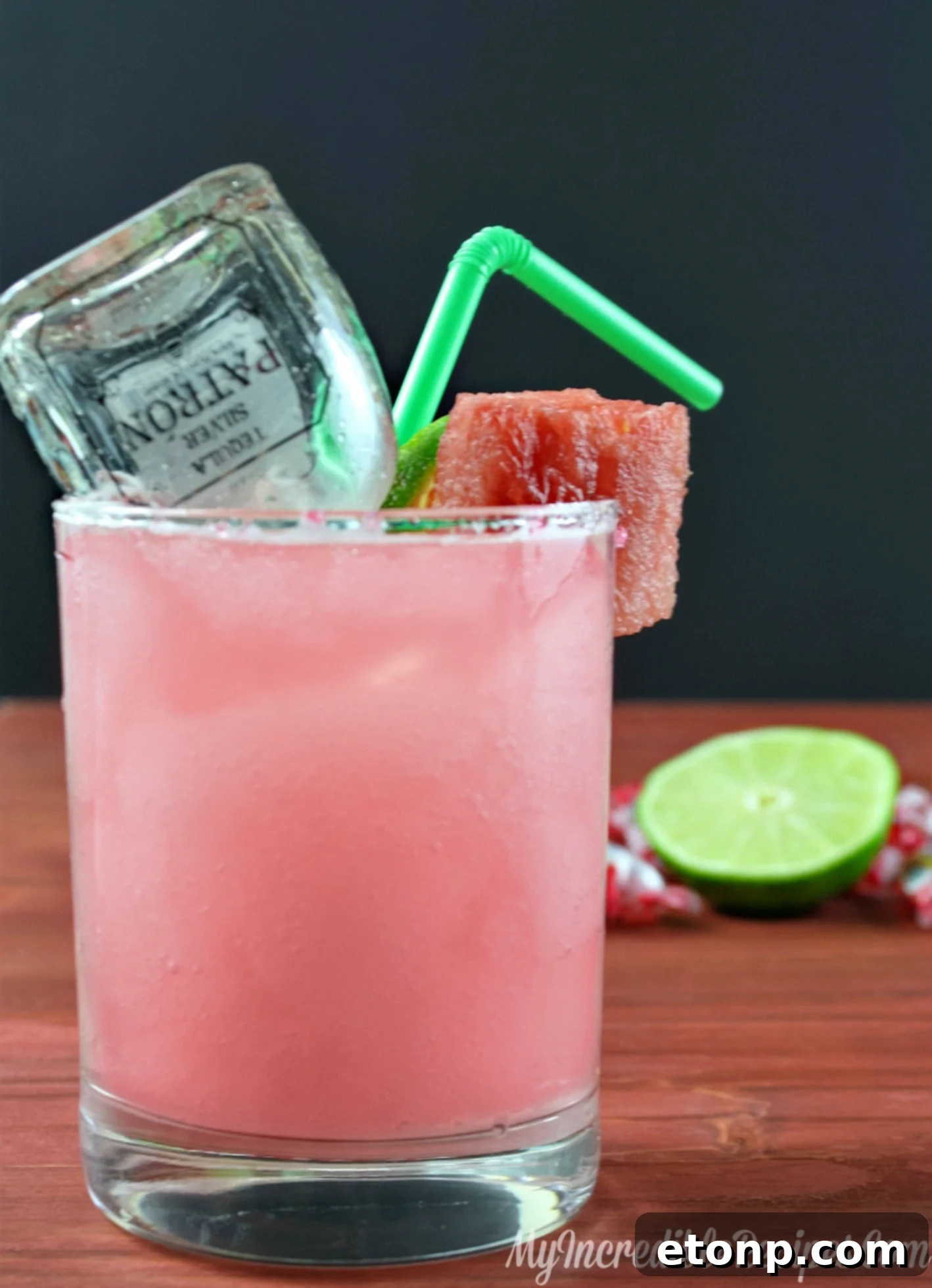 Close-up of a pink Watermelon Margarita in a salt-rimmed glass