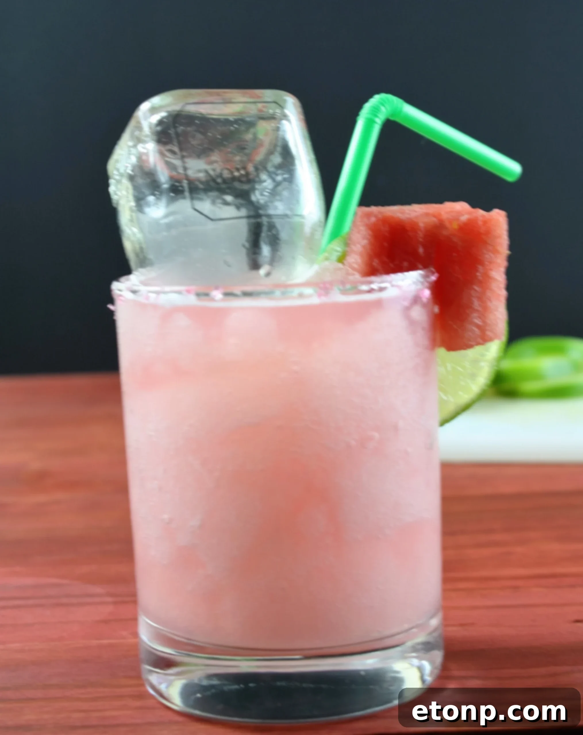 Ingredients for Watermelon Margaritas, including Jolly Ranchers and tequila